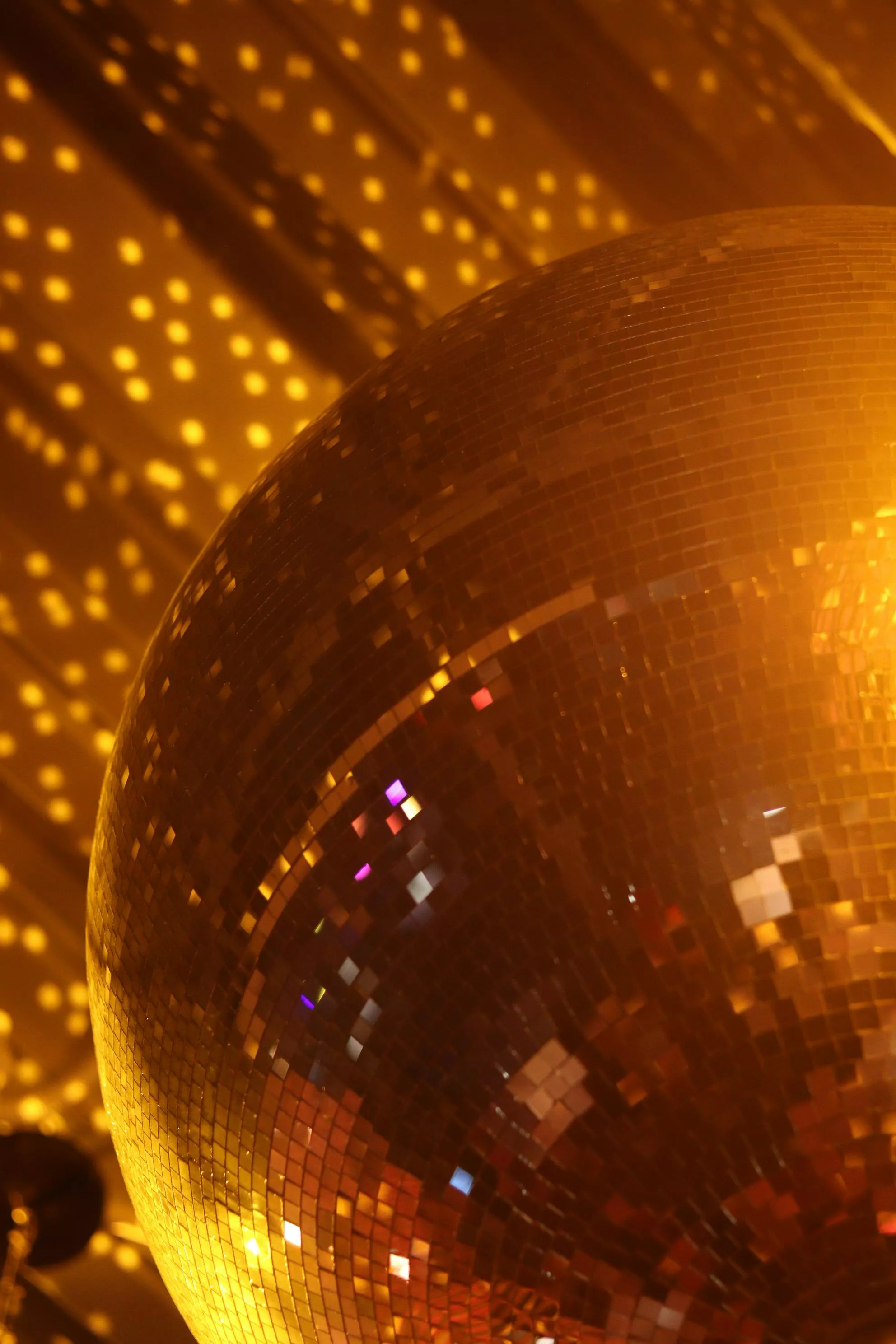 Vibrant Pink Disco Balls Lighting Up