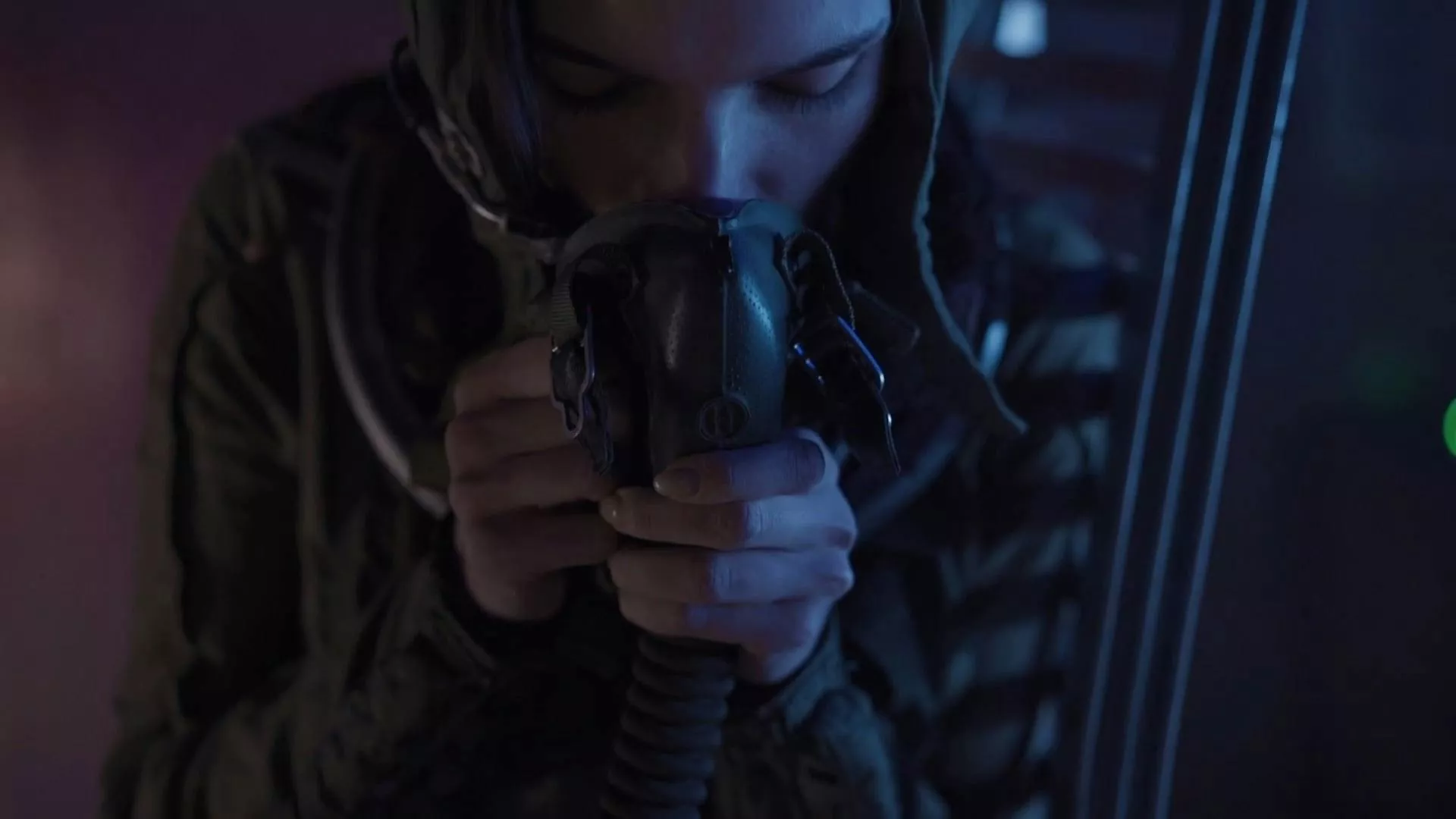 A Woman Breathing With An Oxygen Mask