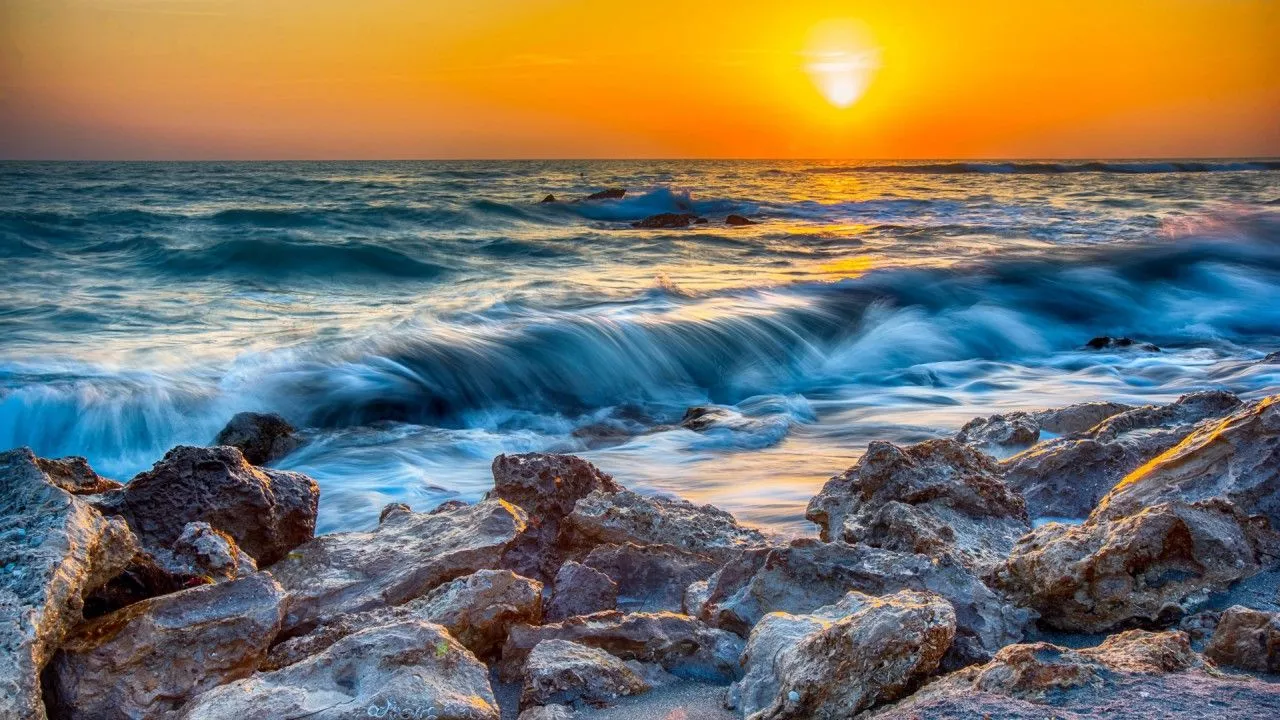 Ocean Waves Stone Rocks During Sunset