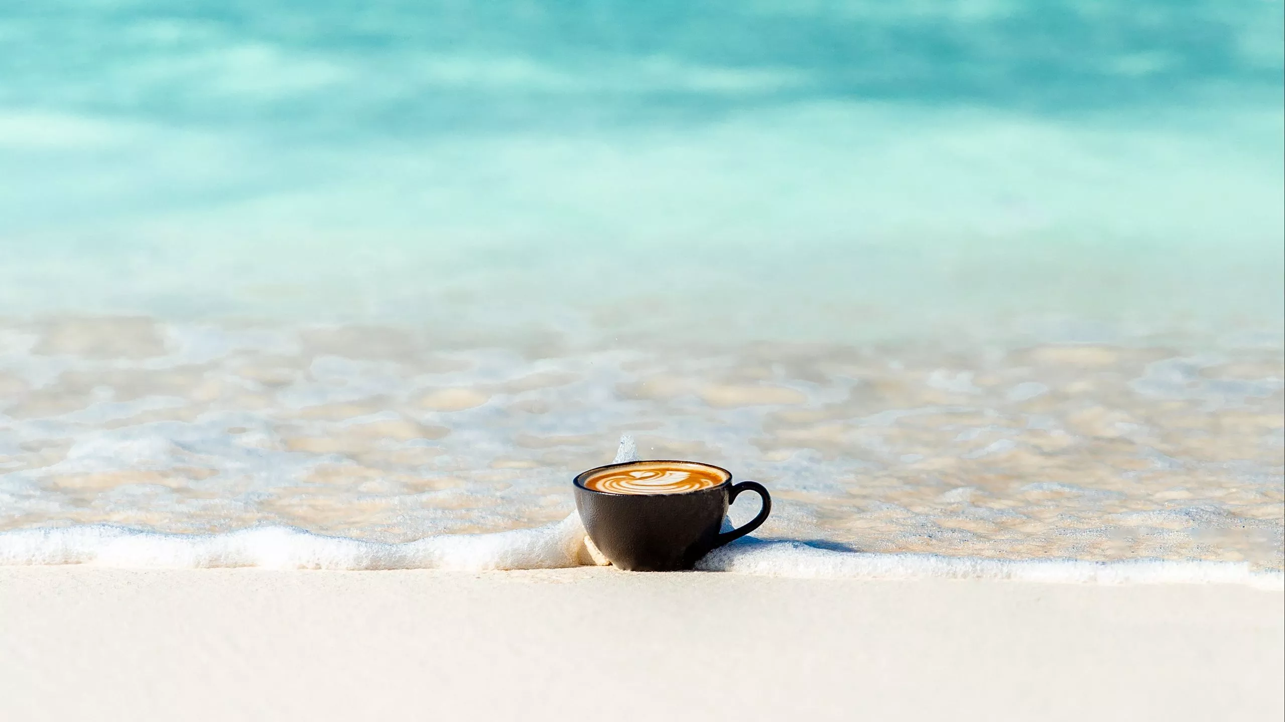 Cup With Coffee On Ocean Sand HD