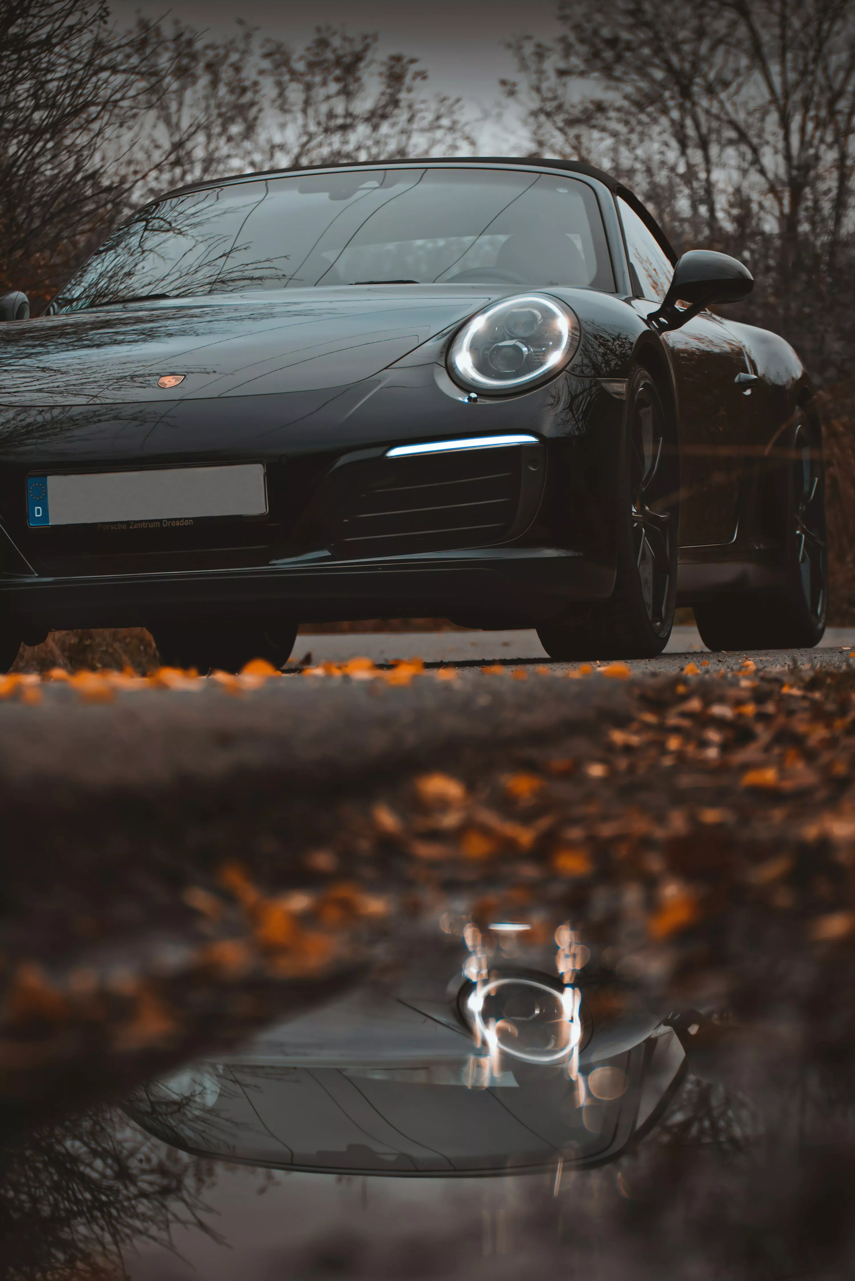 Black porsche 911 on road photo