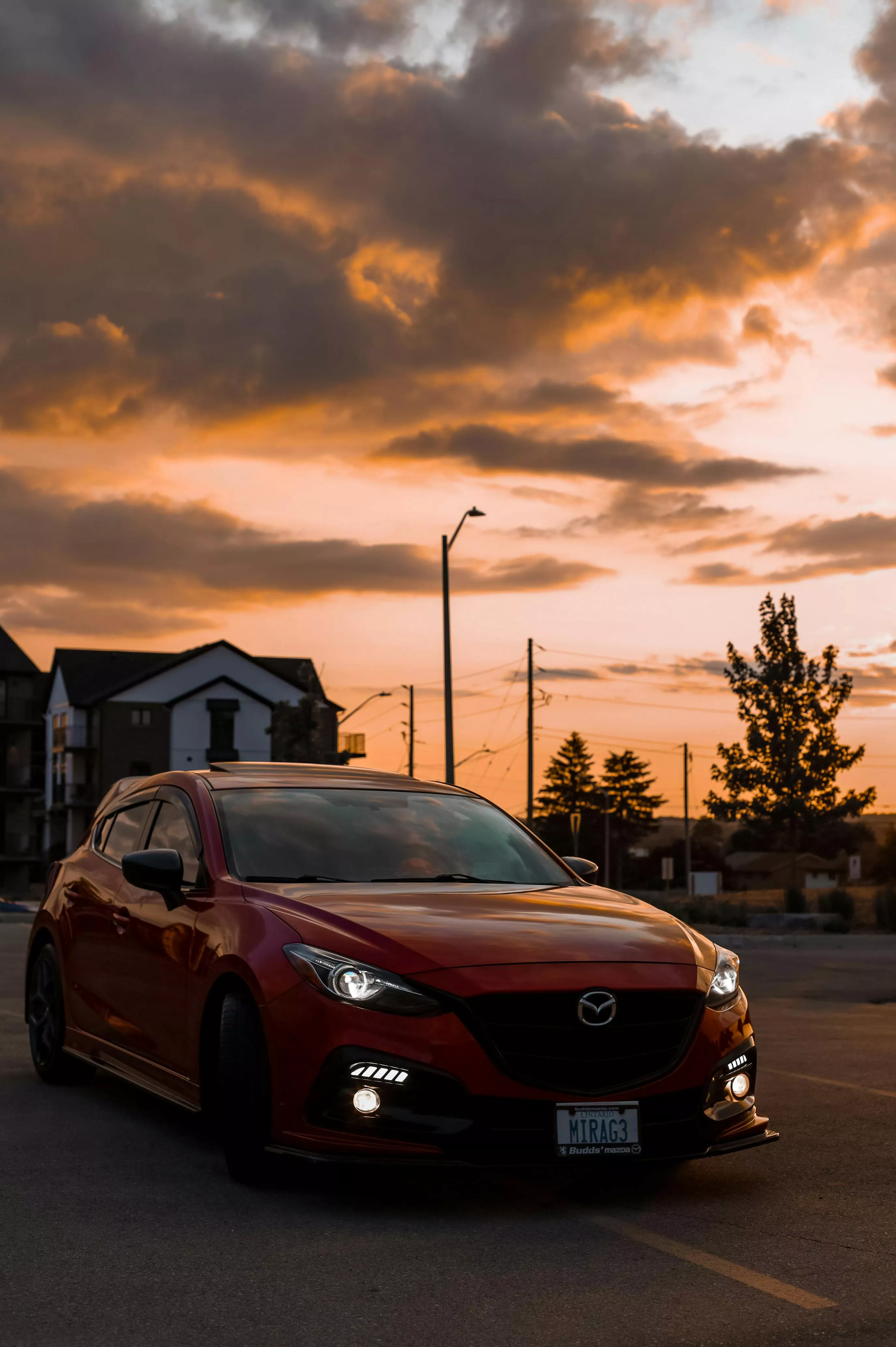 Red Mazda 3 at Sunset · Free