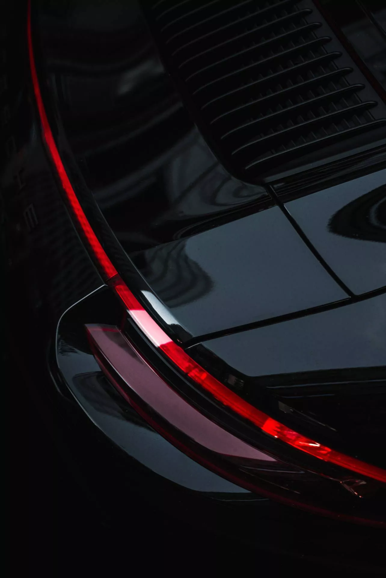 Partial Red And Black Porsche Wallpaper