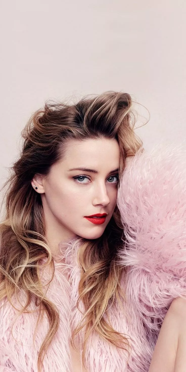 Beautiful actress, Amber Heard, blue