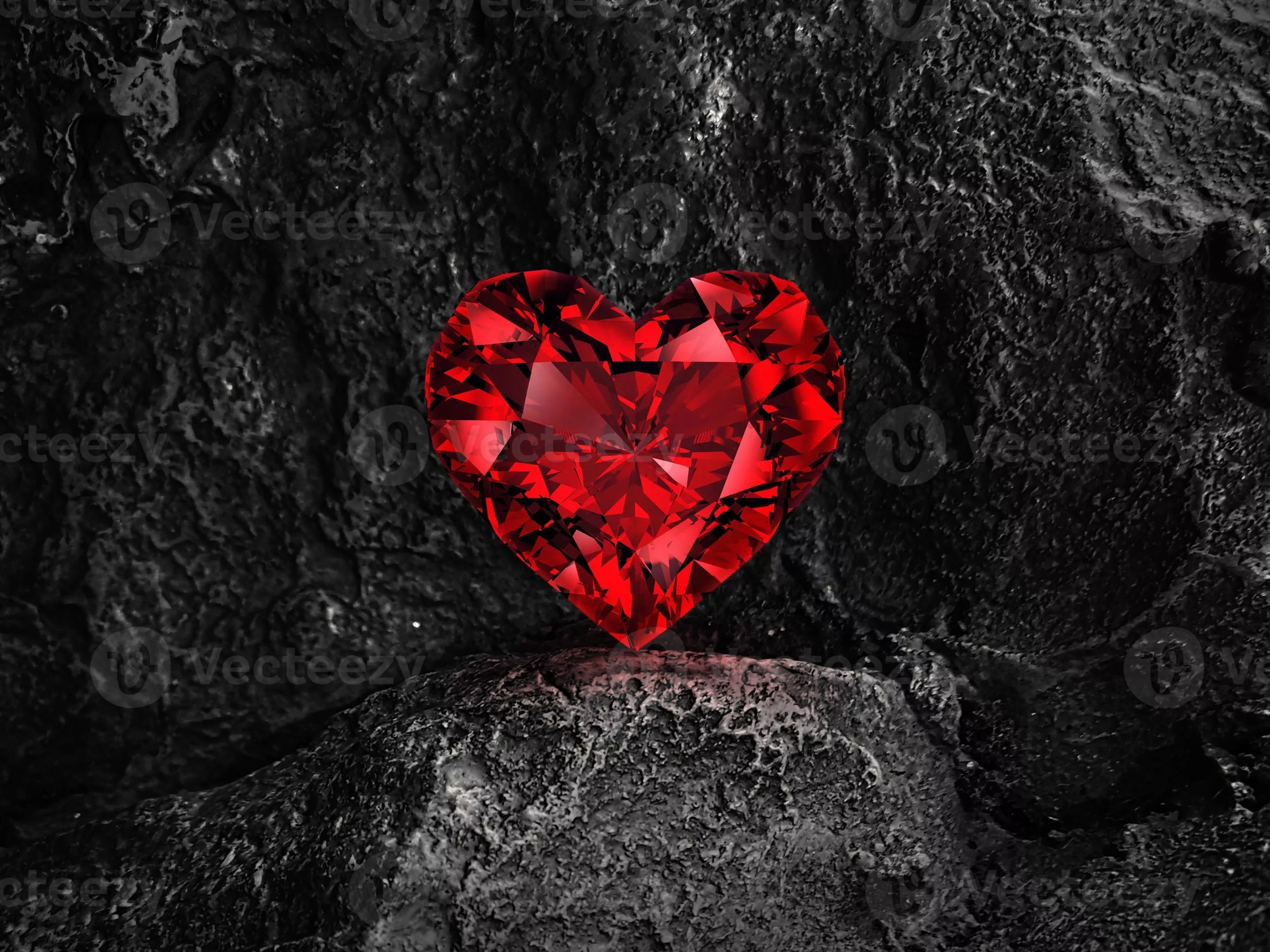 Red heart shaped diamond on black coal