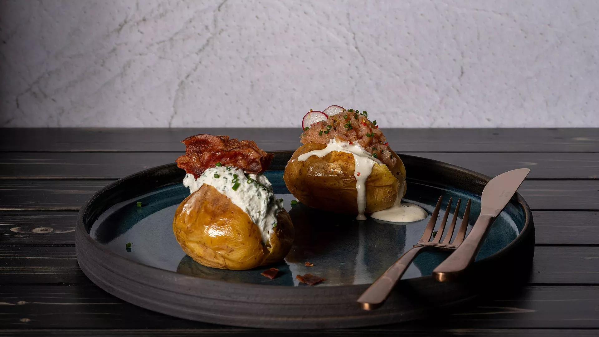 Baked potatoes with bacon and herb