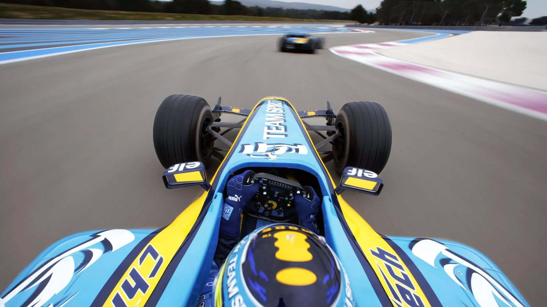Yellow, blue, and white F1 car