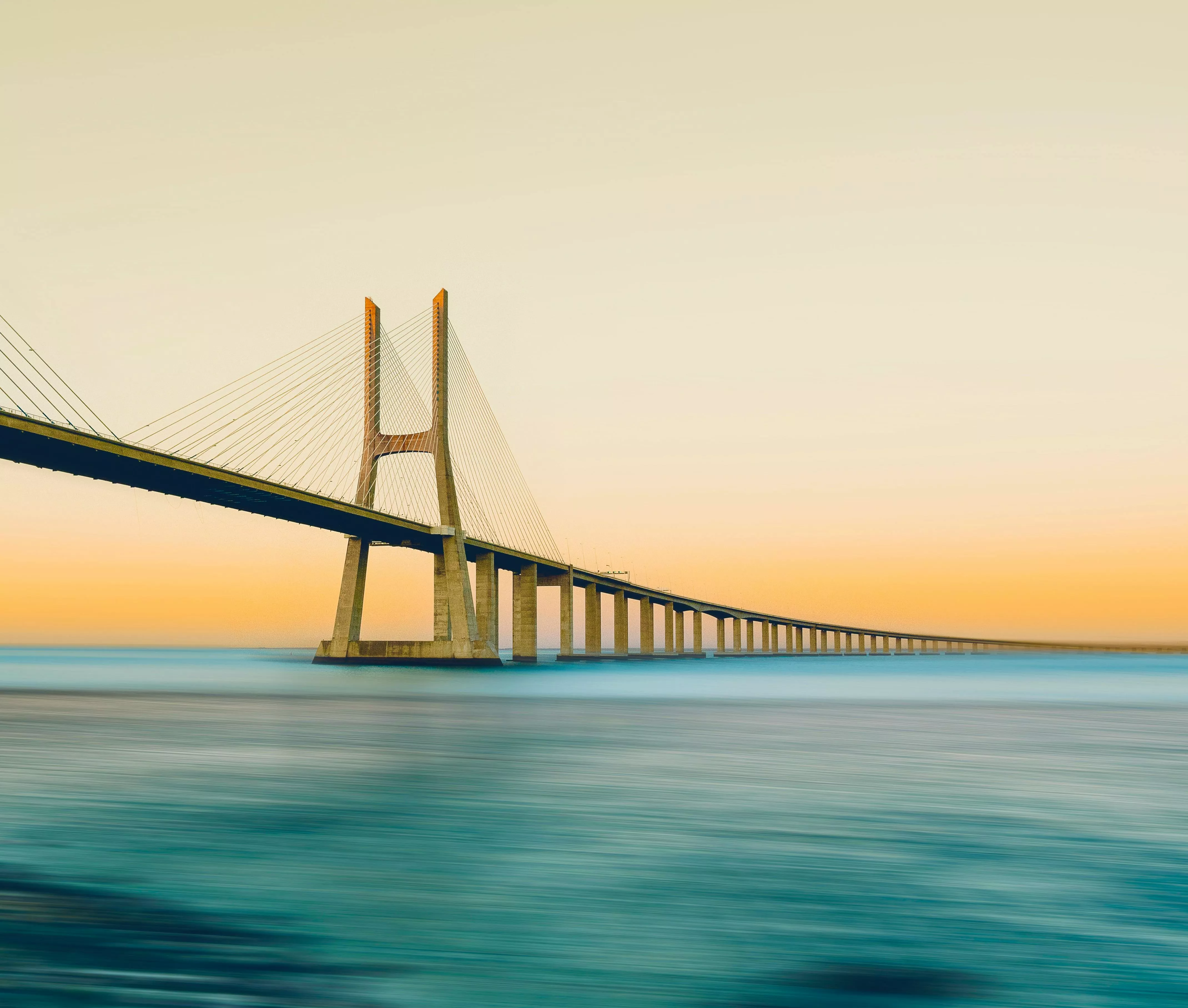 Vasco da Gama Bridge at Sunset · Free