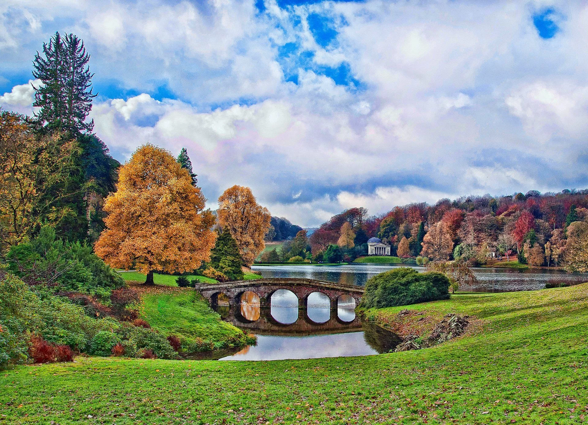 A bridge on the background of an autumn