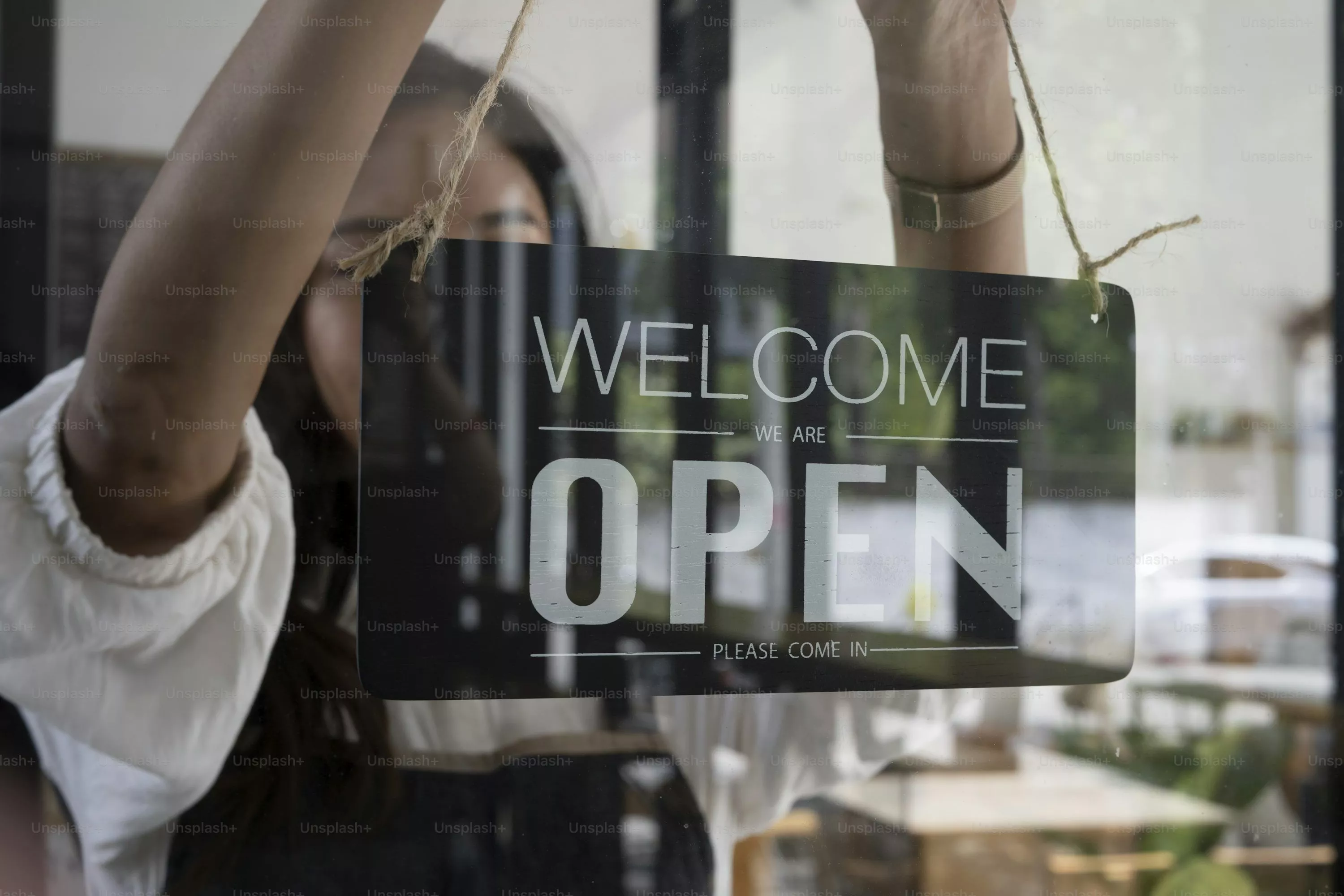 open hanging from a string photo