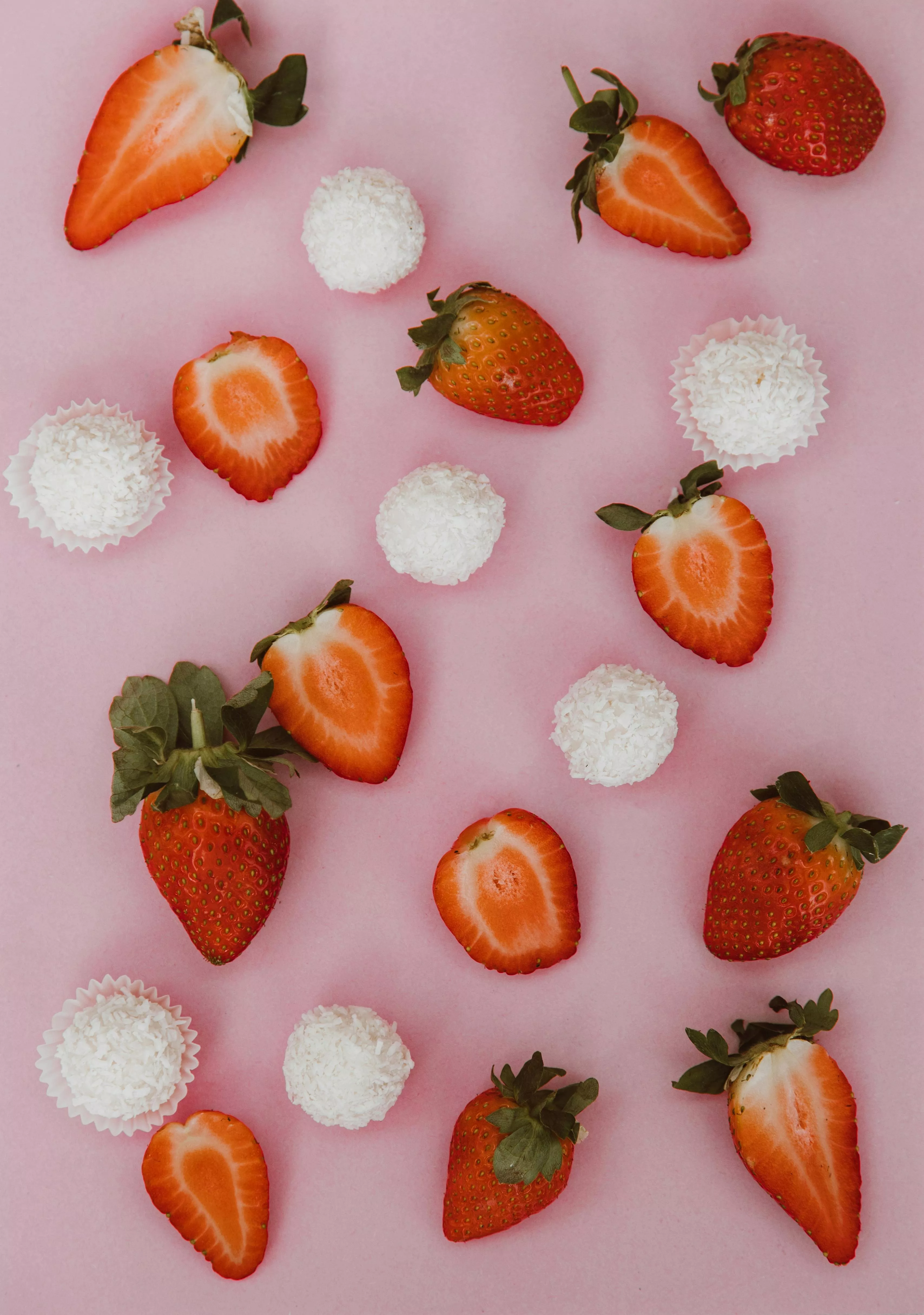 Slices of Strawberries on a Pink