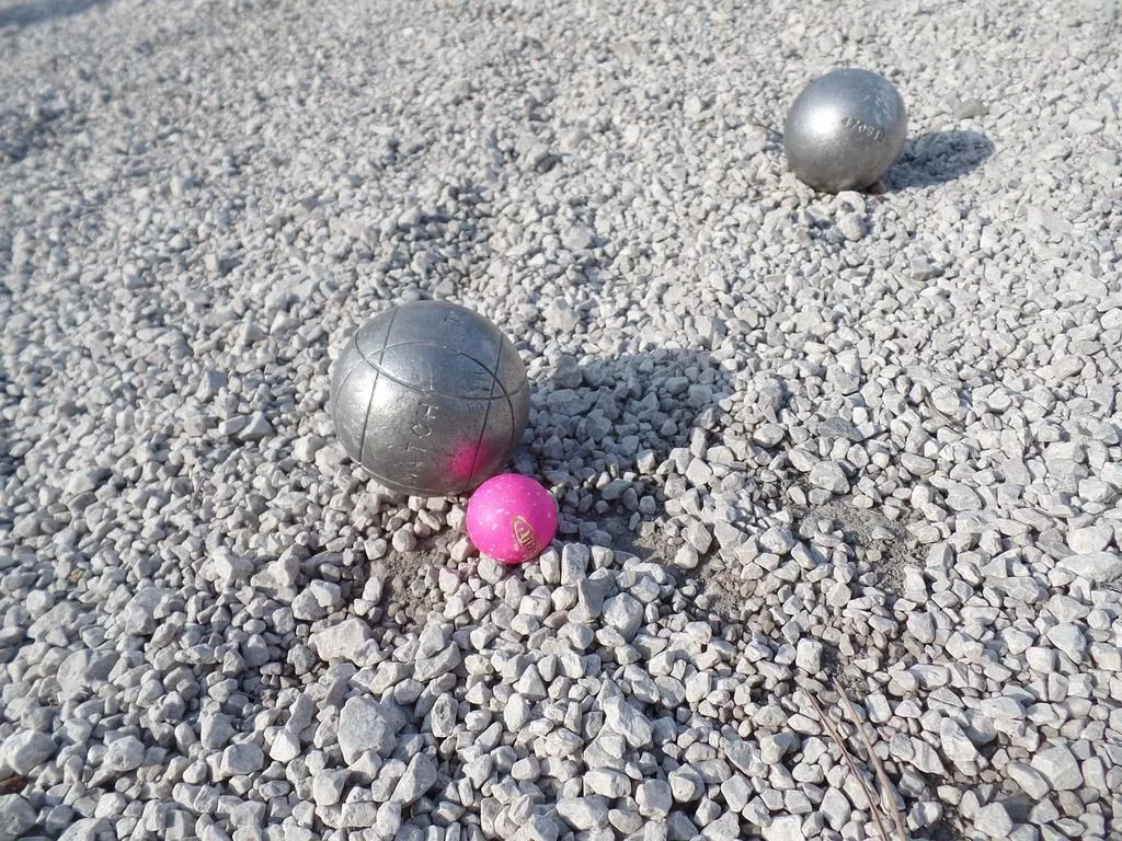 gravel ground. Petanque balls jack