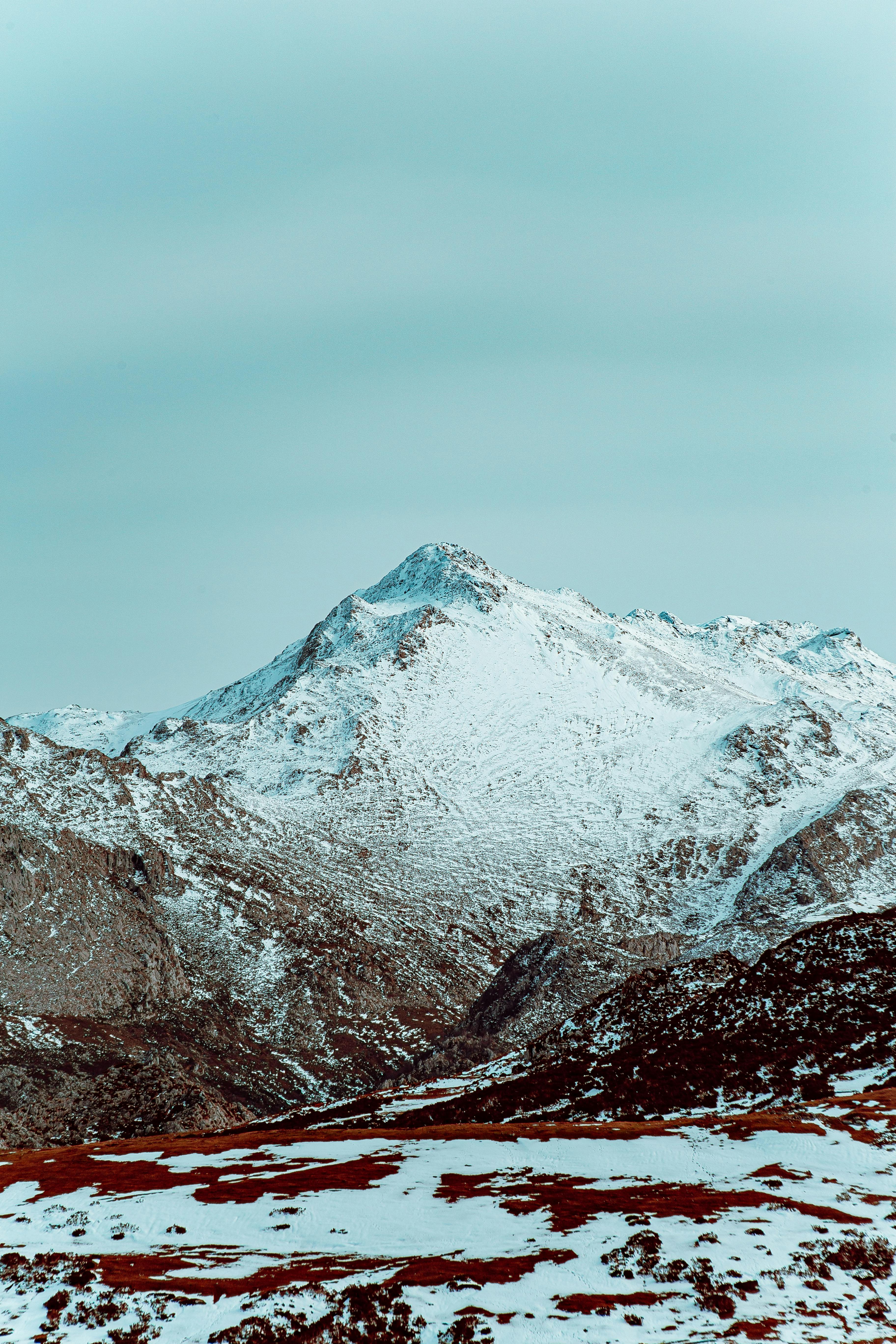 Snow Covered Mountain Under Blue Sky