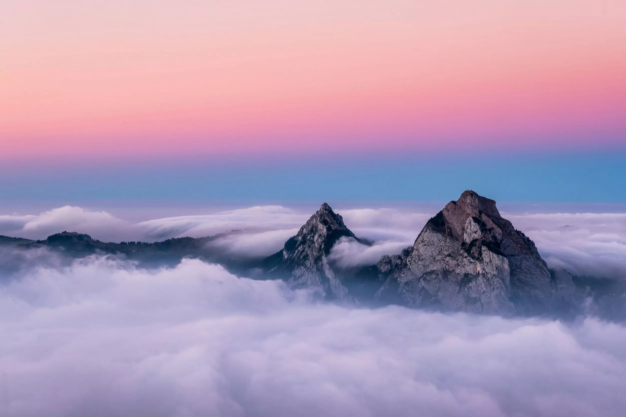 Colorful Sunrise Hues Over The Clouds