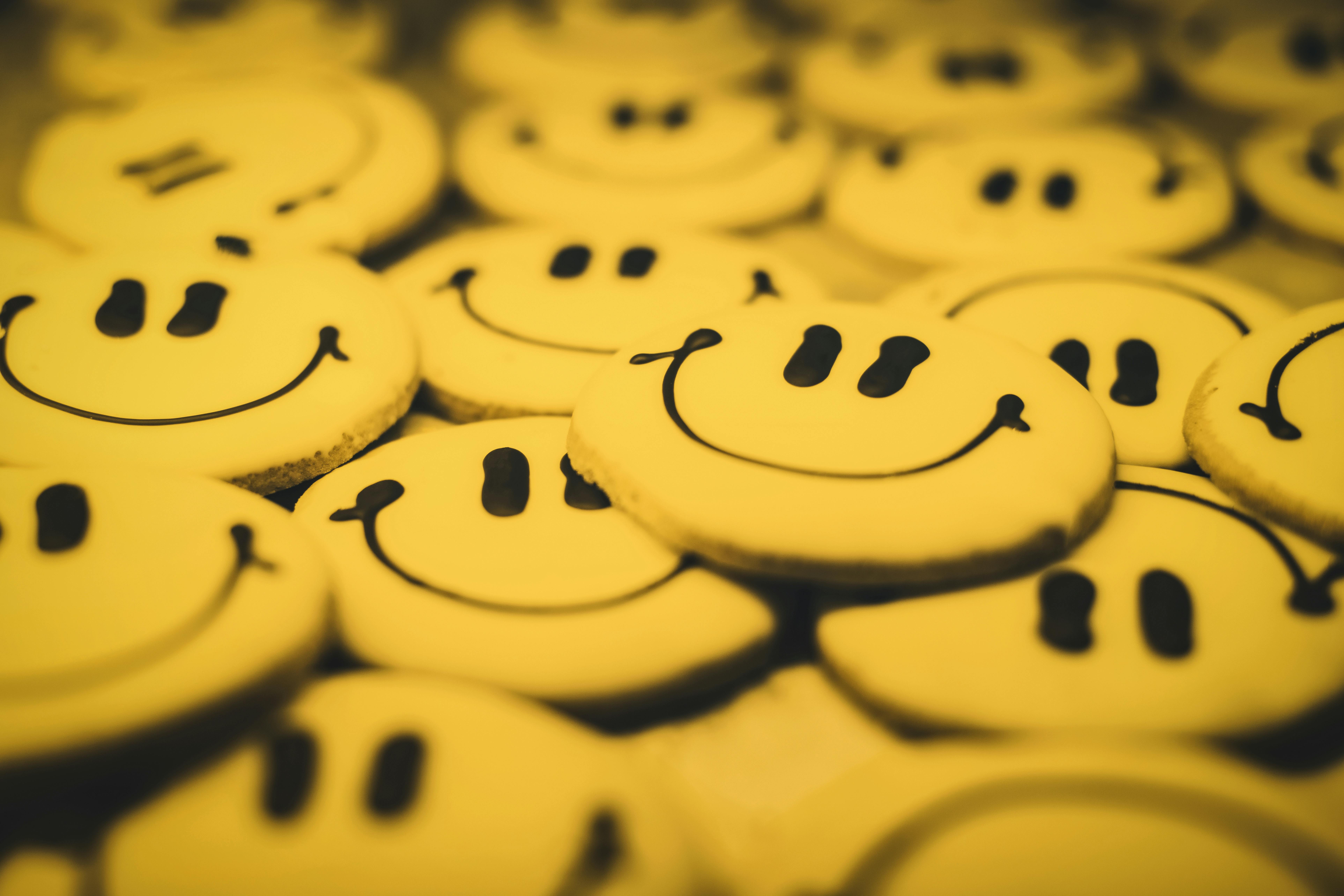 Yellow Smiley Emoji on Gray Surface