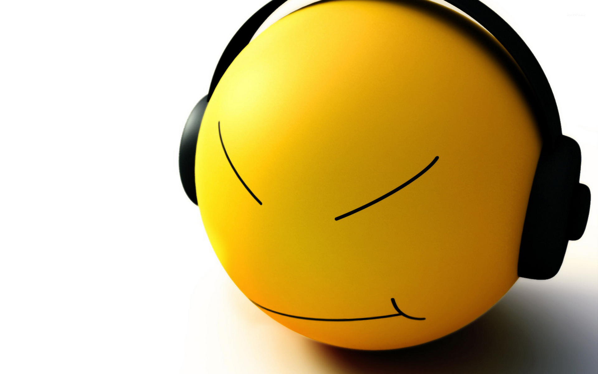 Smiley face with headphones wallpaper