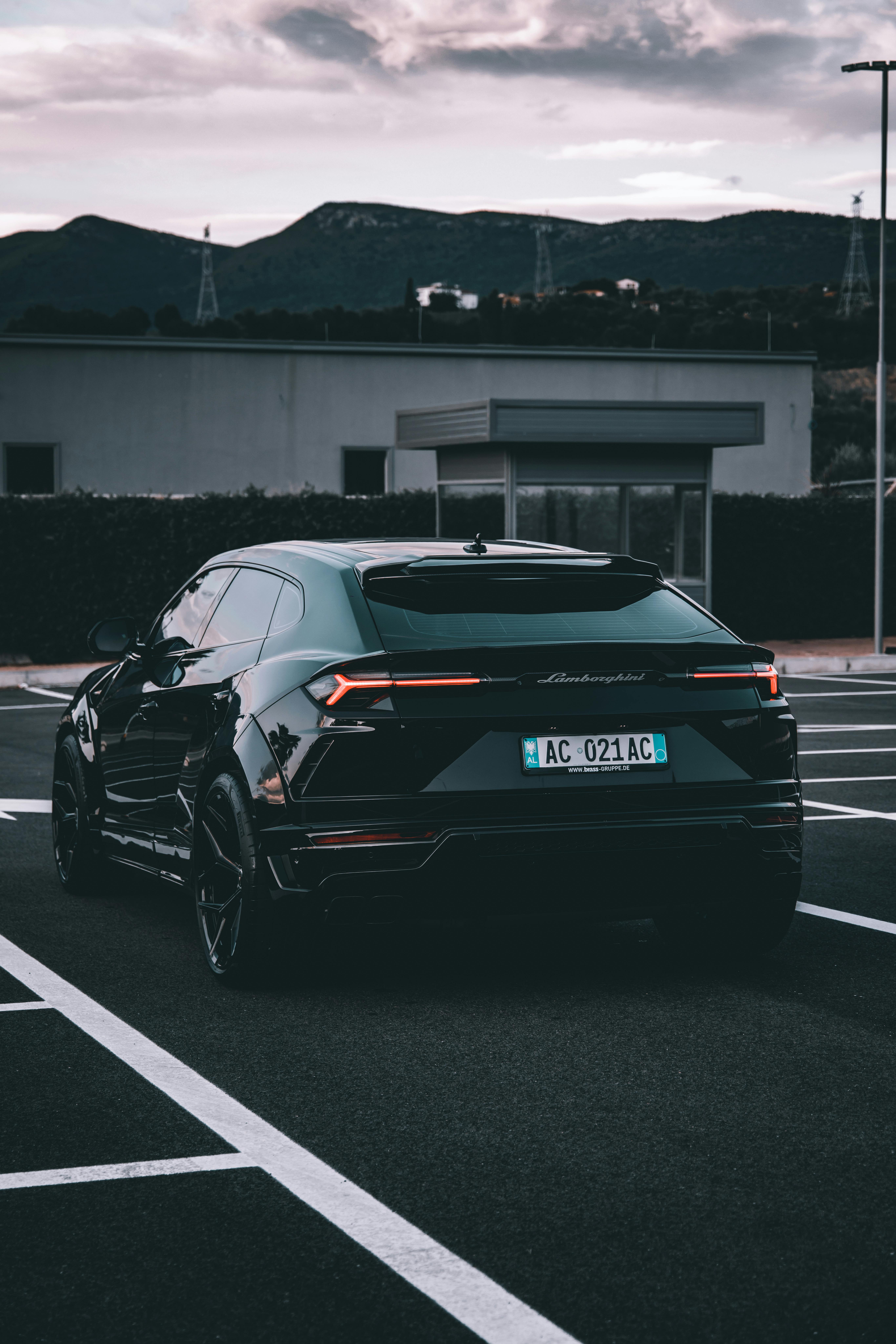A Black Lamborghini Urus Driving on a