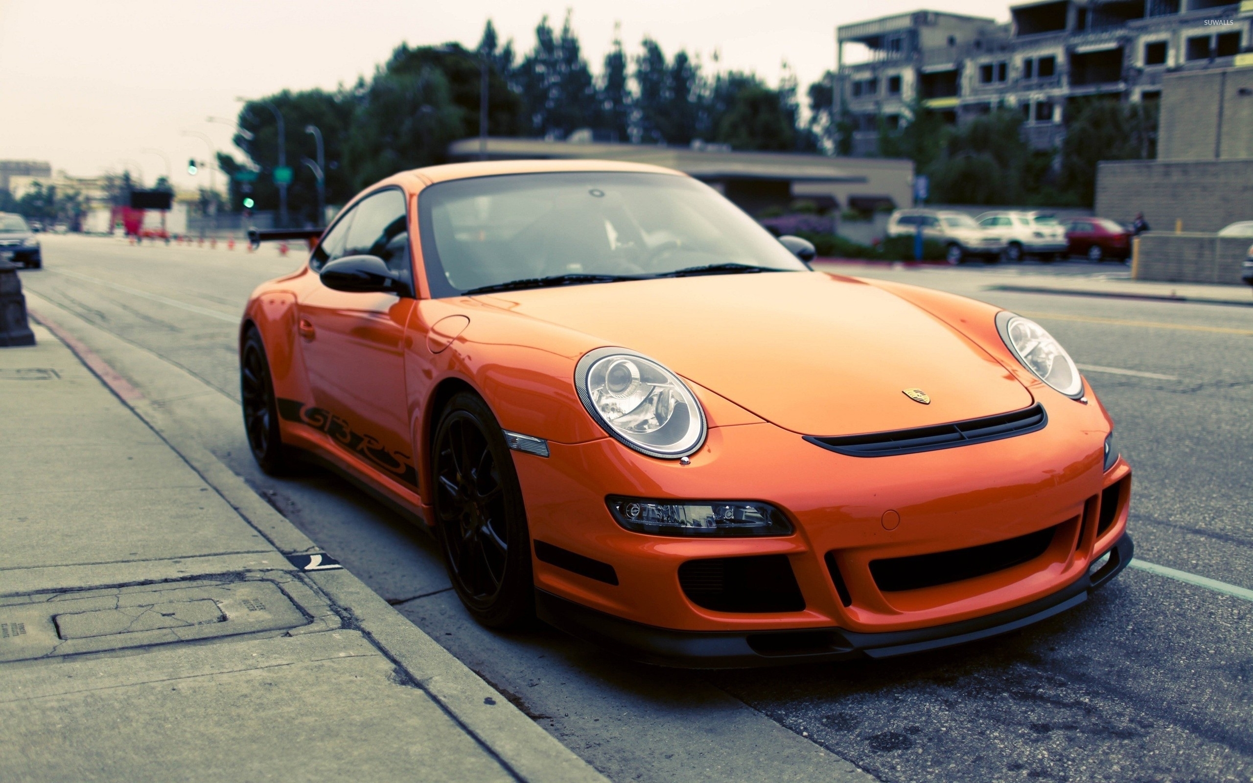 Parked orange Porsche 997 GT3 RS