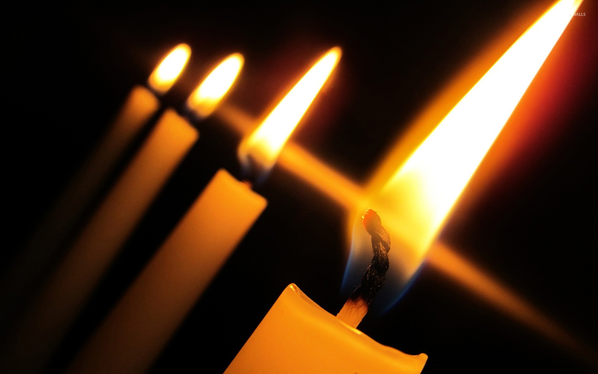 Burning candles wallpaper