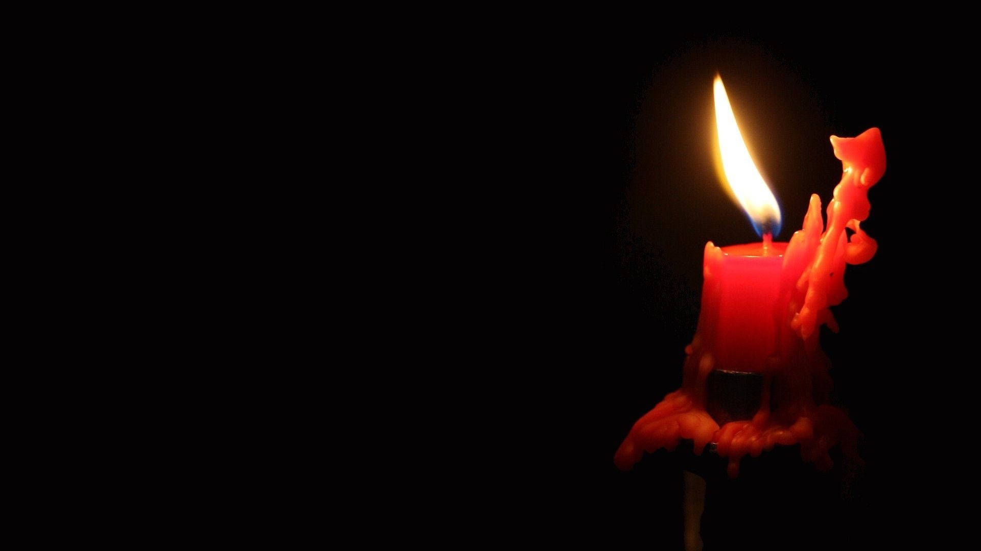 Download Burning Red Candle Wallpaper