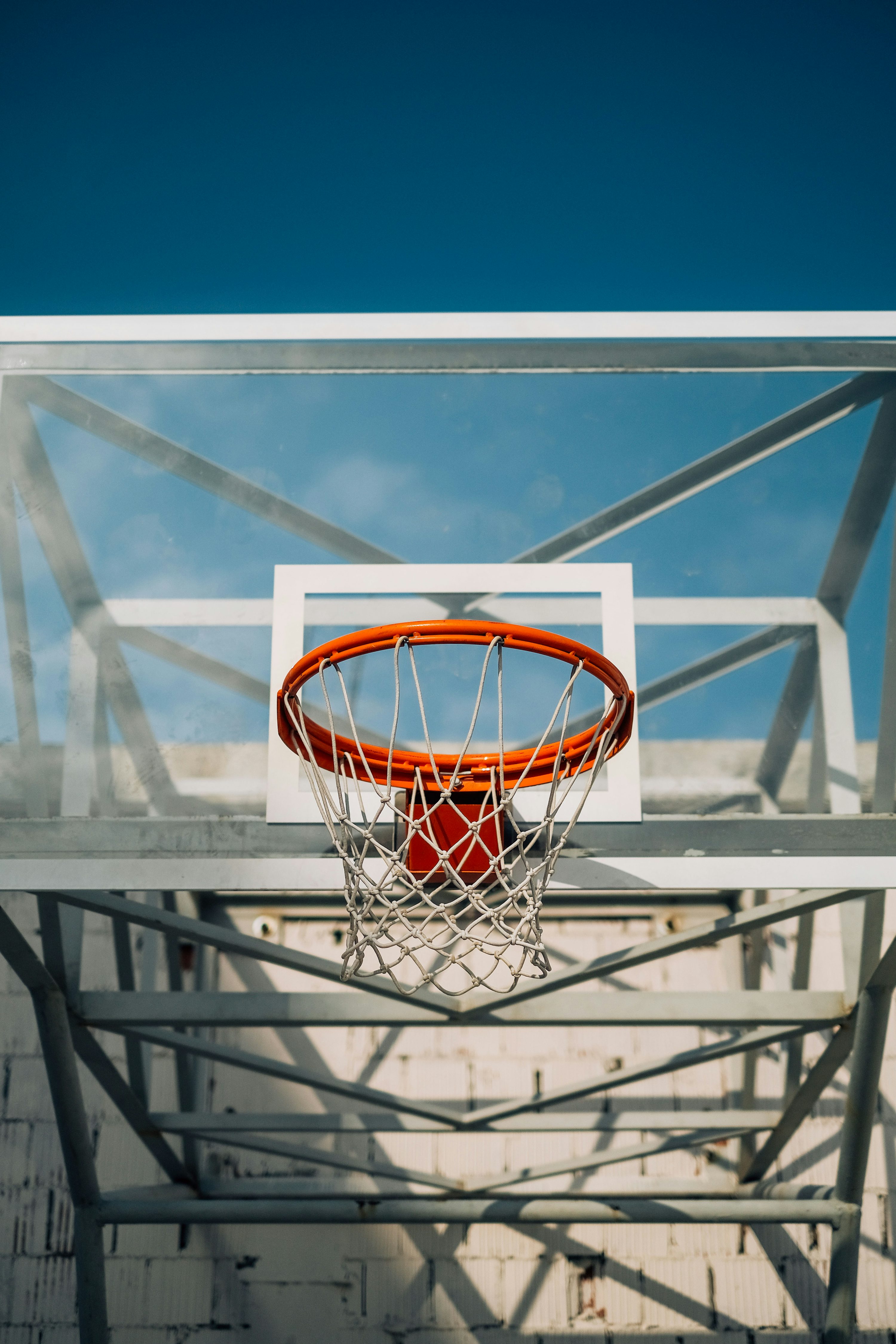 Orange and white basketball hoop photo