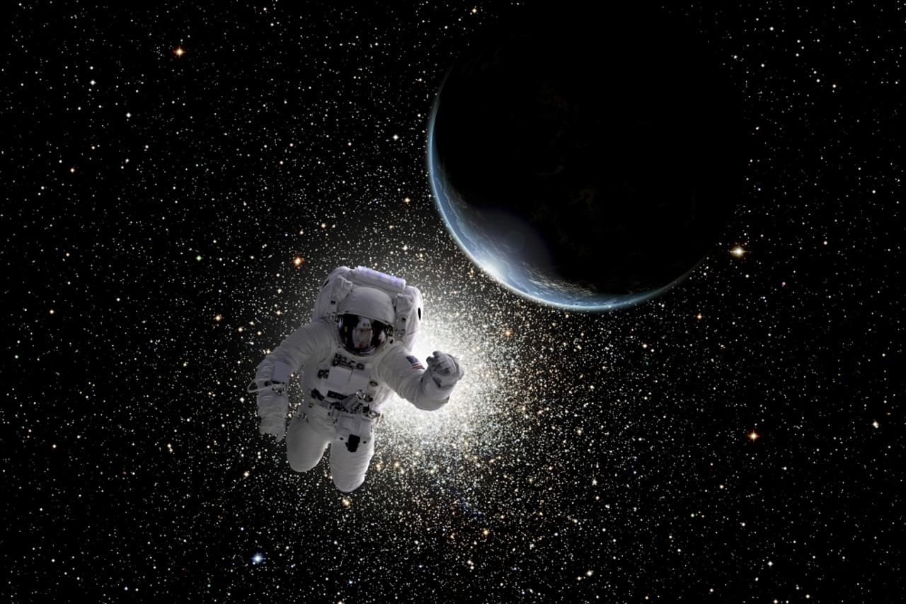 astronaut floating in outer space