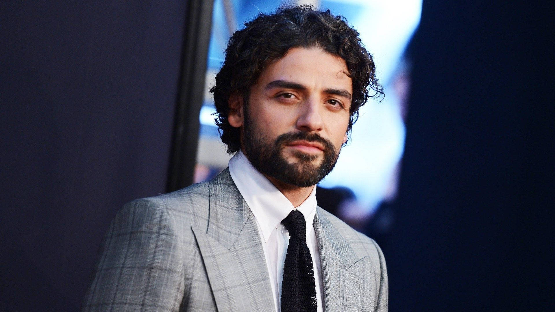 Oscar Isaac Elegant Suit Wallpaper