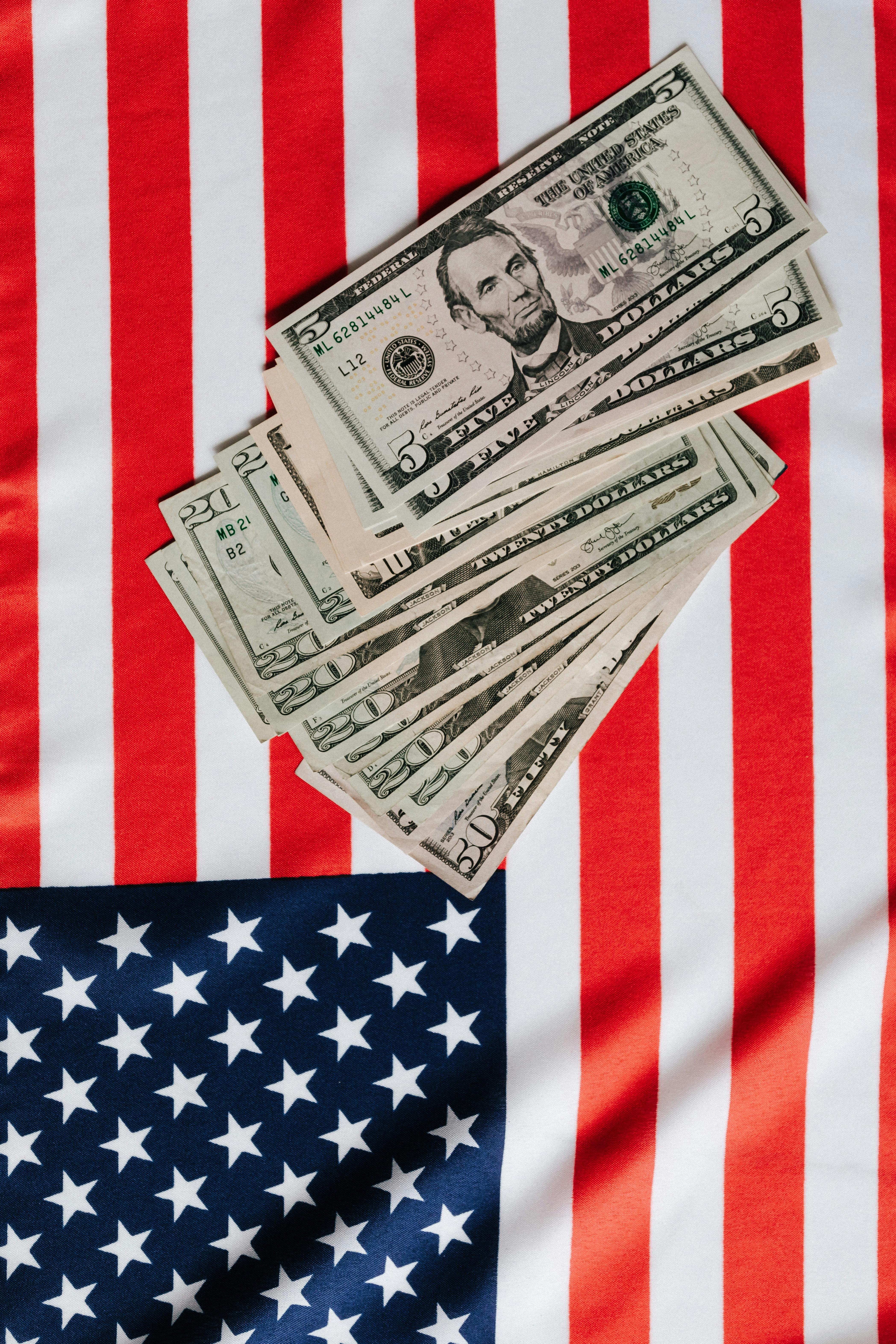 American dollars placed on national flag · Free