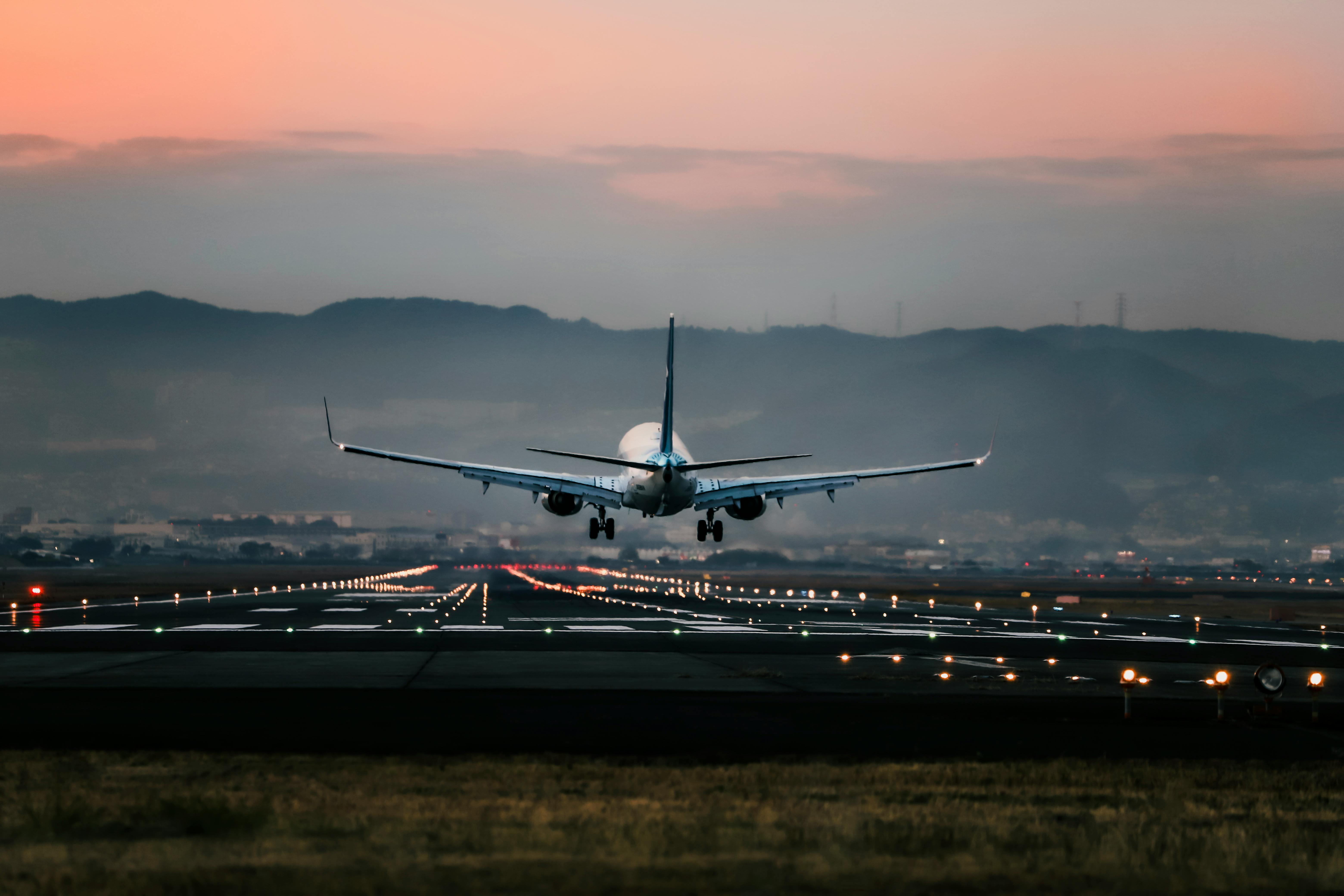 Plane Landing on Runway · Free