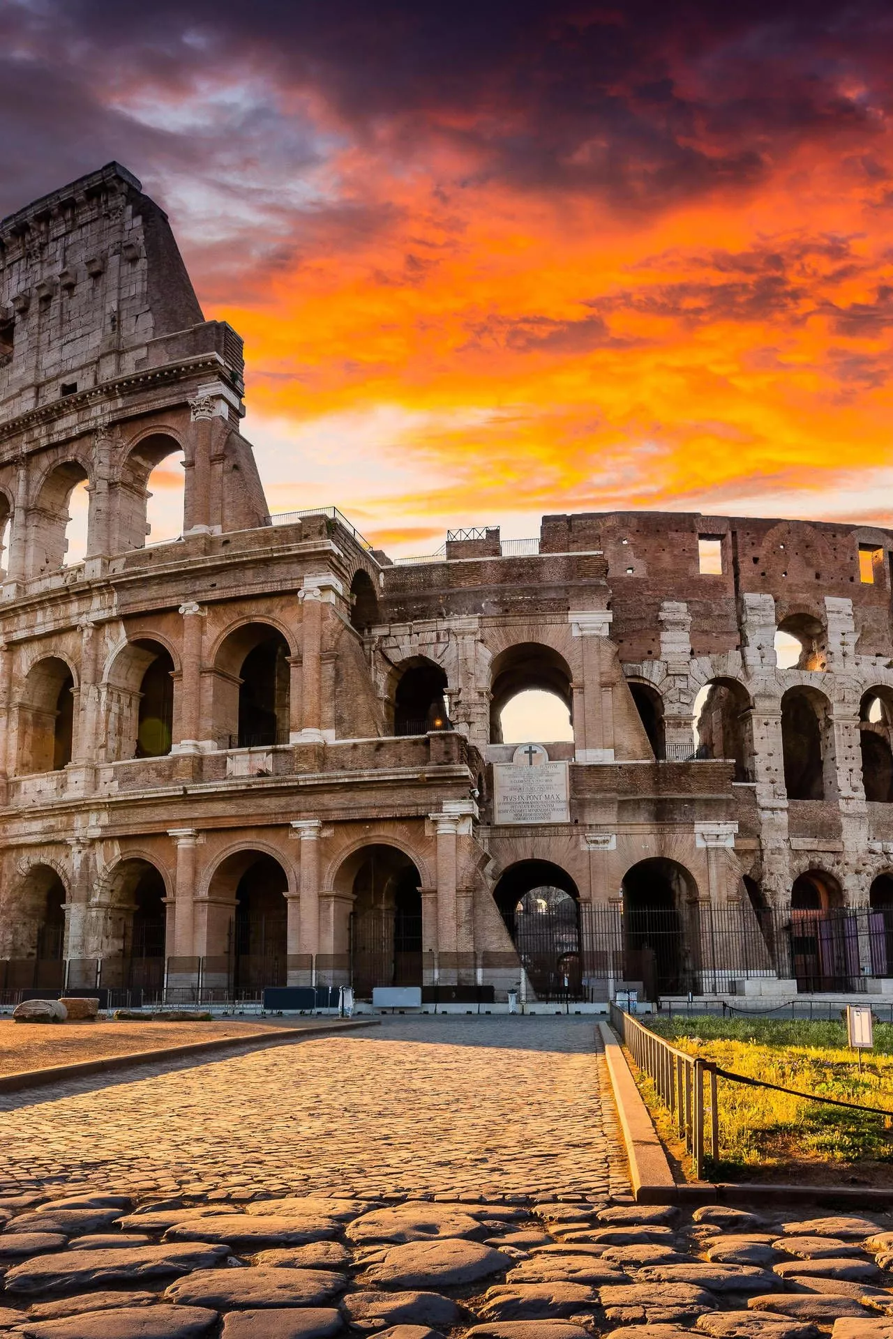 Roman Colosseum Beneath The Sunset Sky