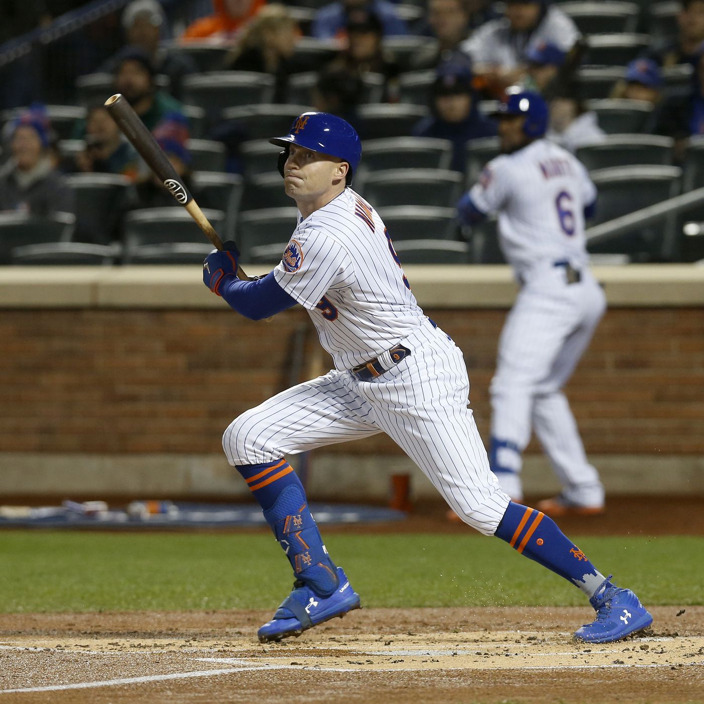 Manchon de bras blanc Bruce Bolt porté par Brandon Nimmo, des