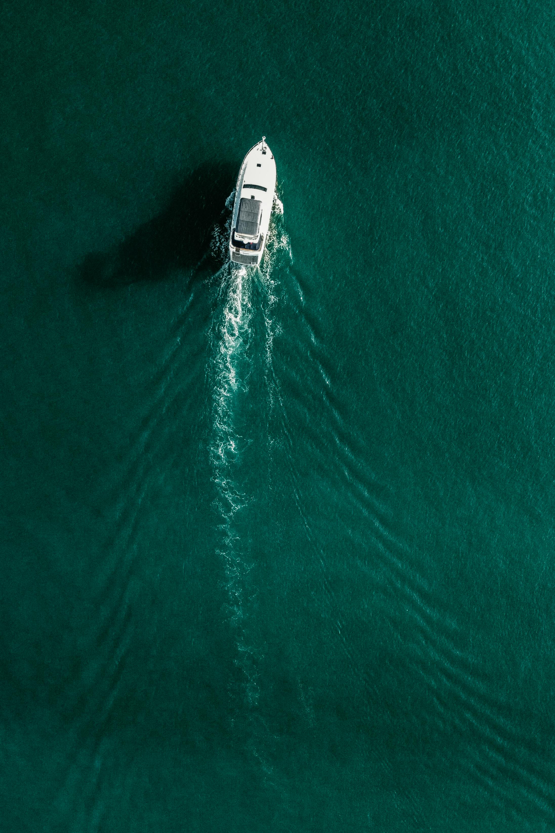 Bird Eye View on Yacht in Sea · Free