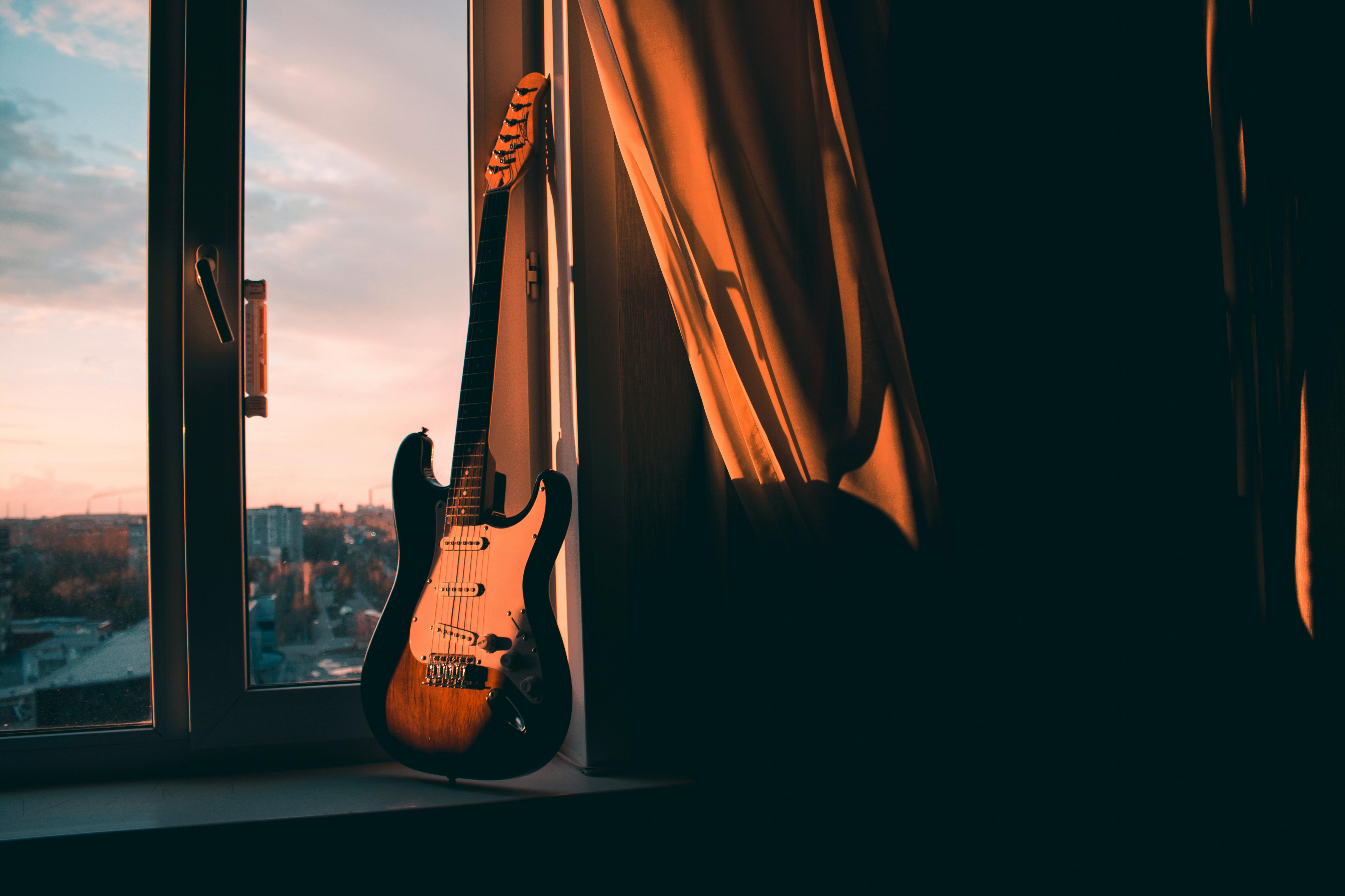 Guitar Beside Window · Free