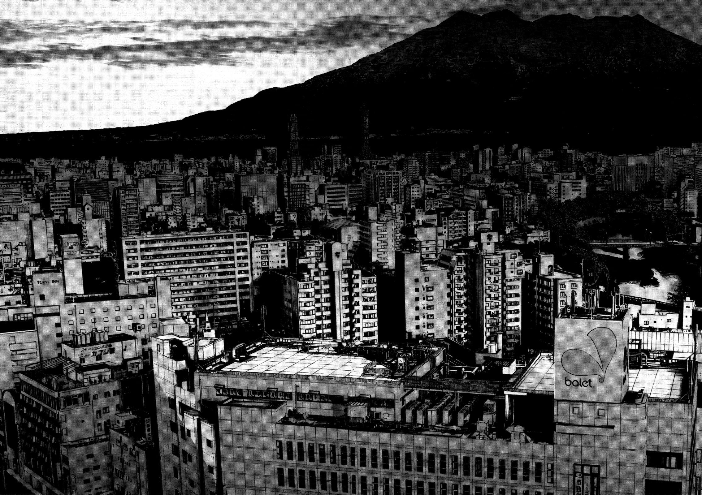 Grayscale photo of city buildings