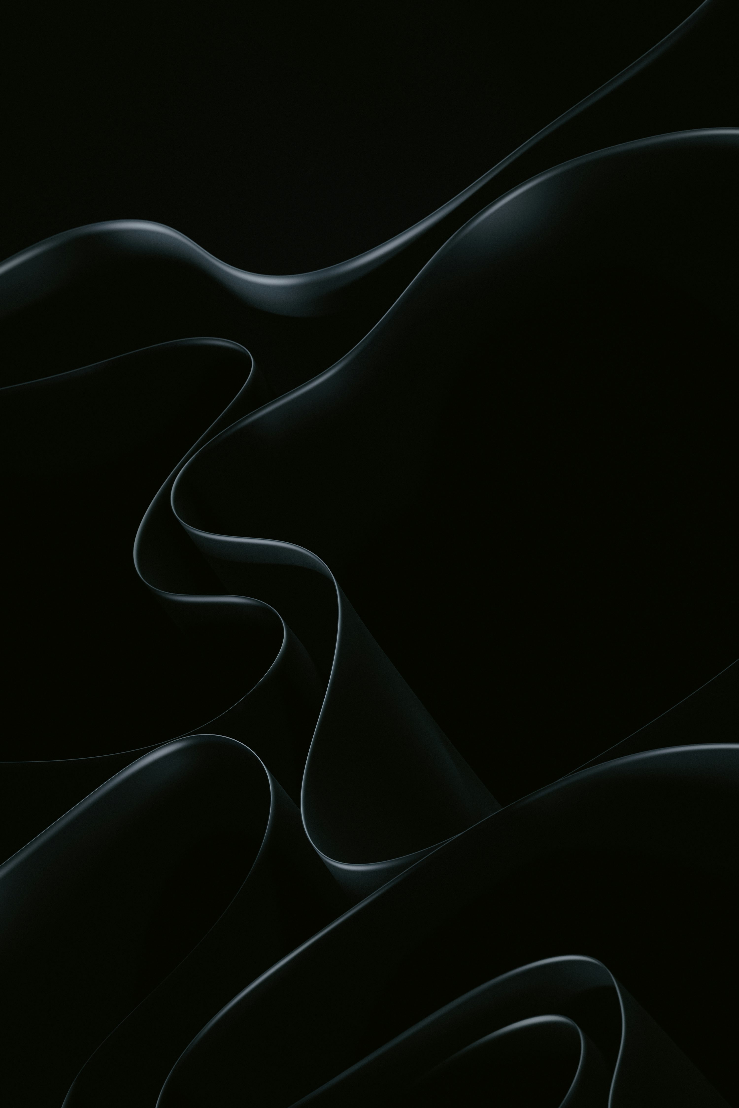 An abstract black background with wavy