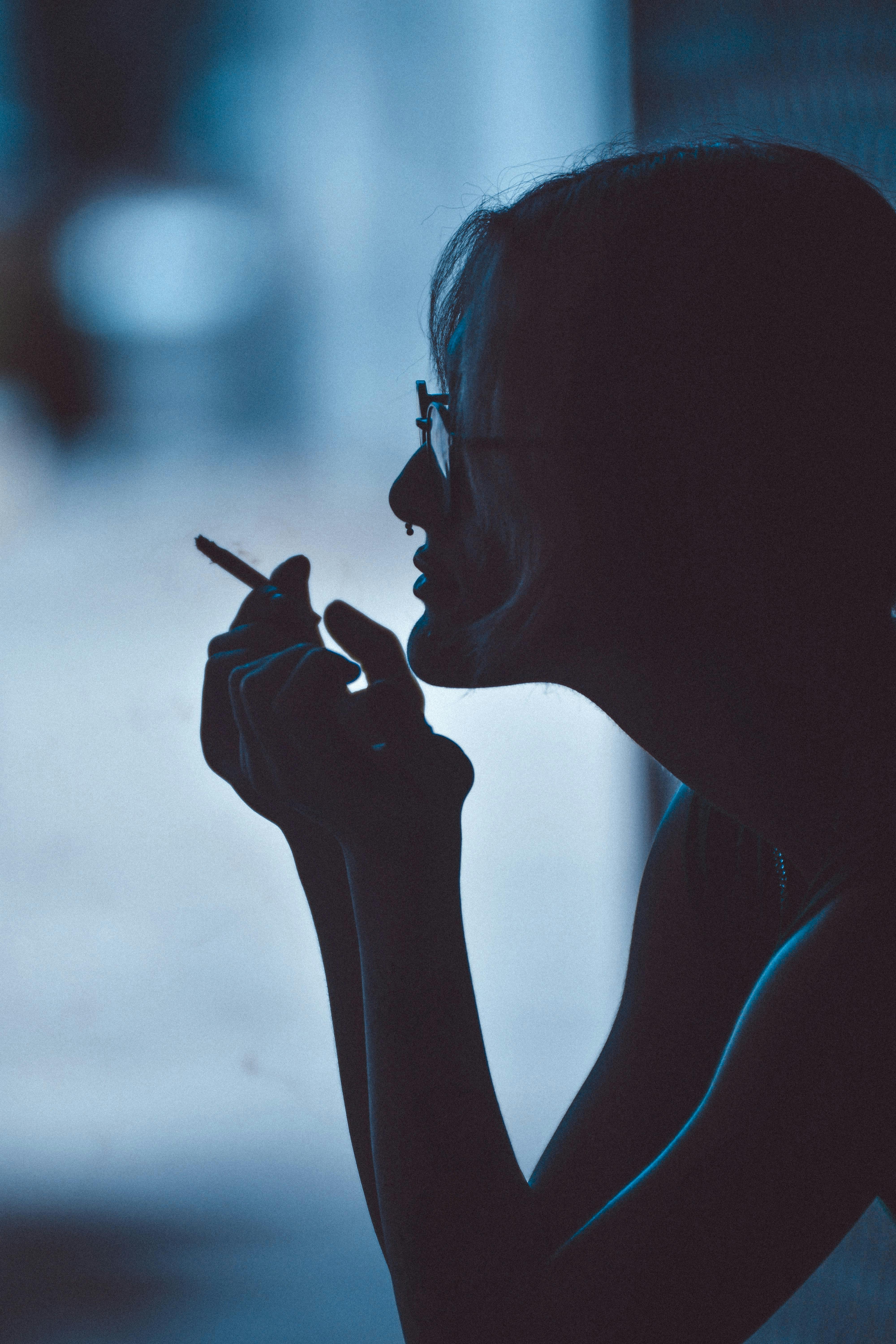 A woman smoking a cigarette