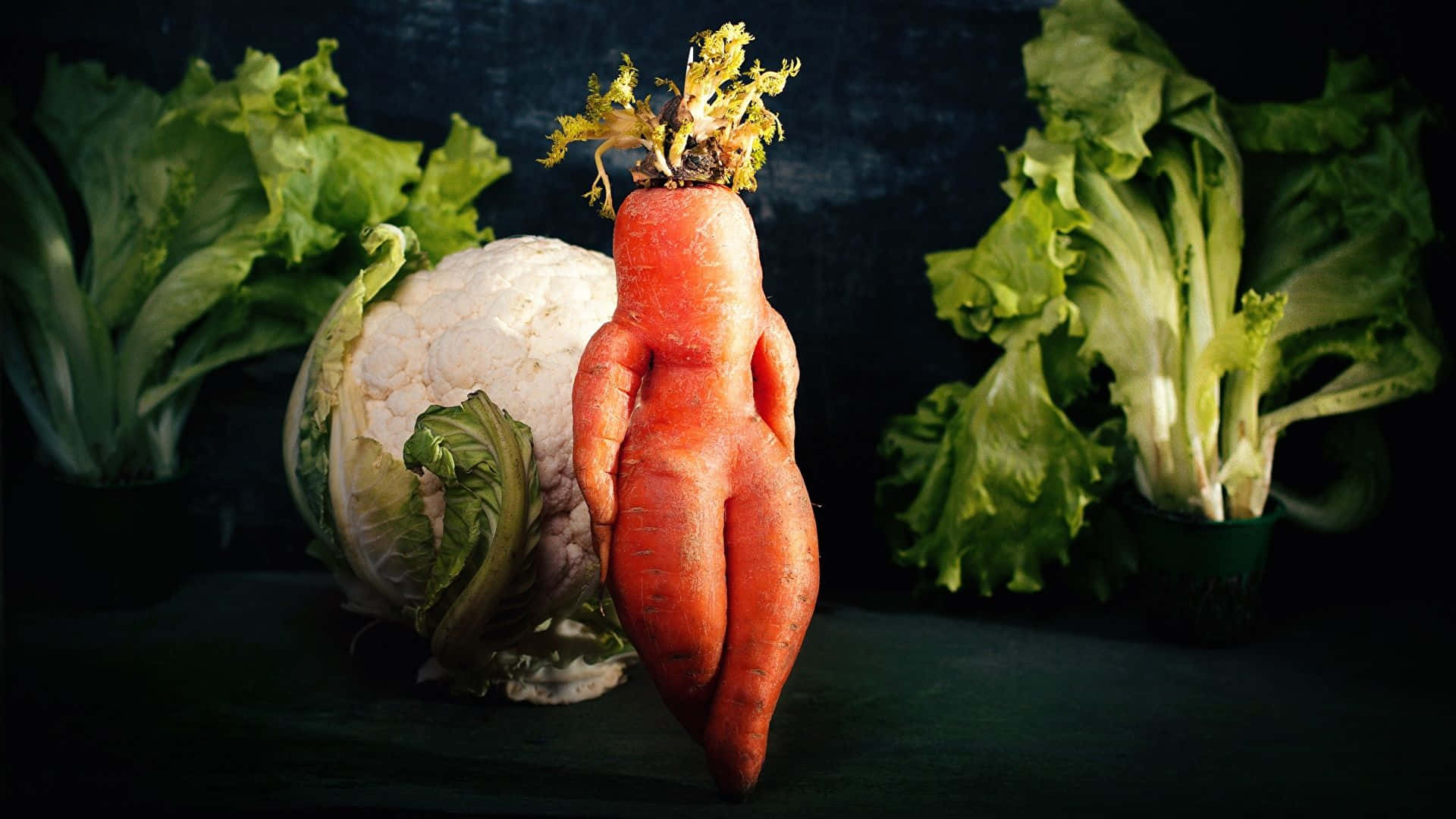Download A Carrot With A Head Wallpaper