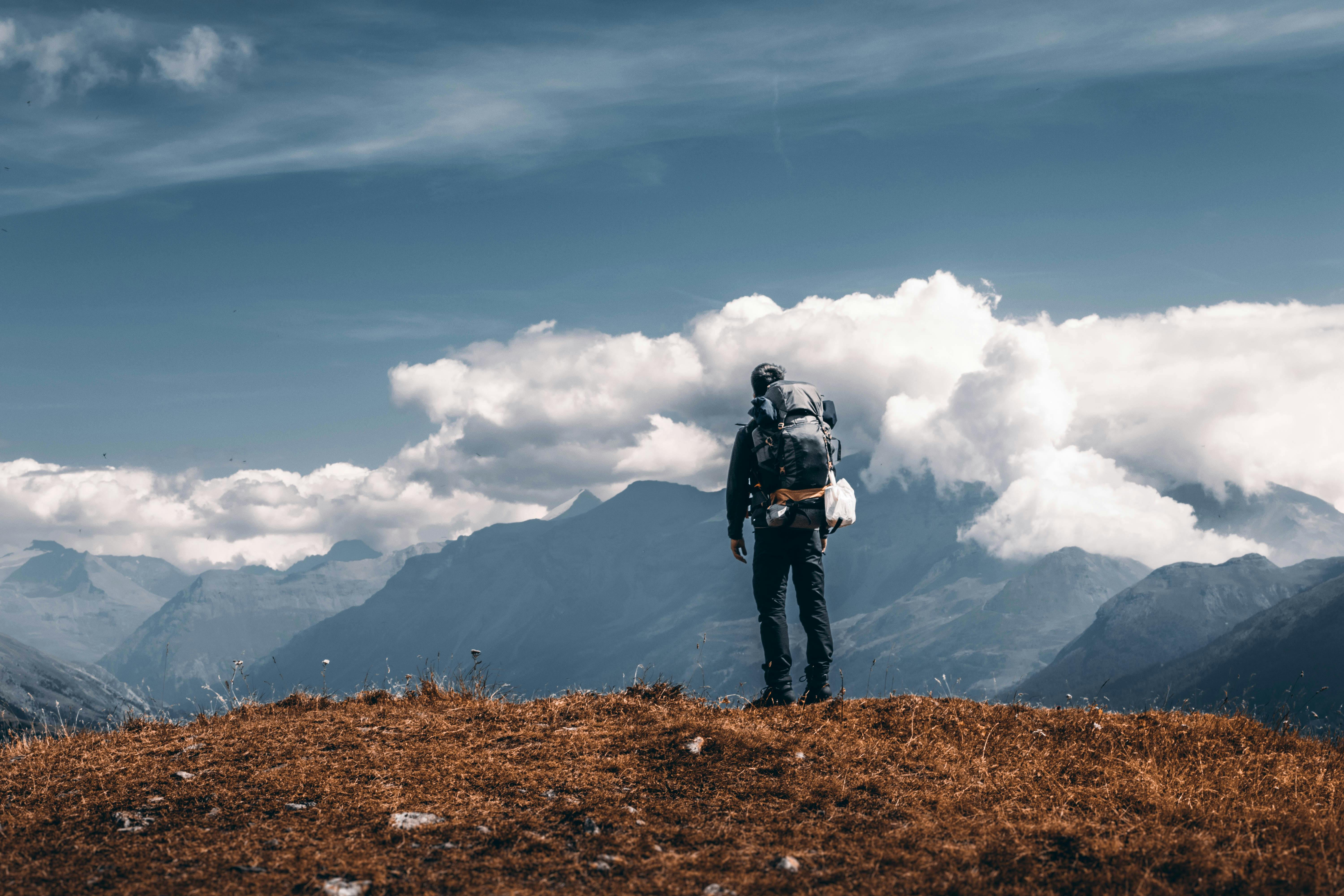 Backpacker in Mountains · Free