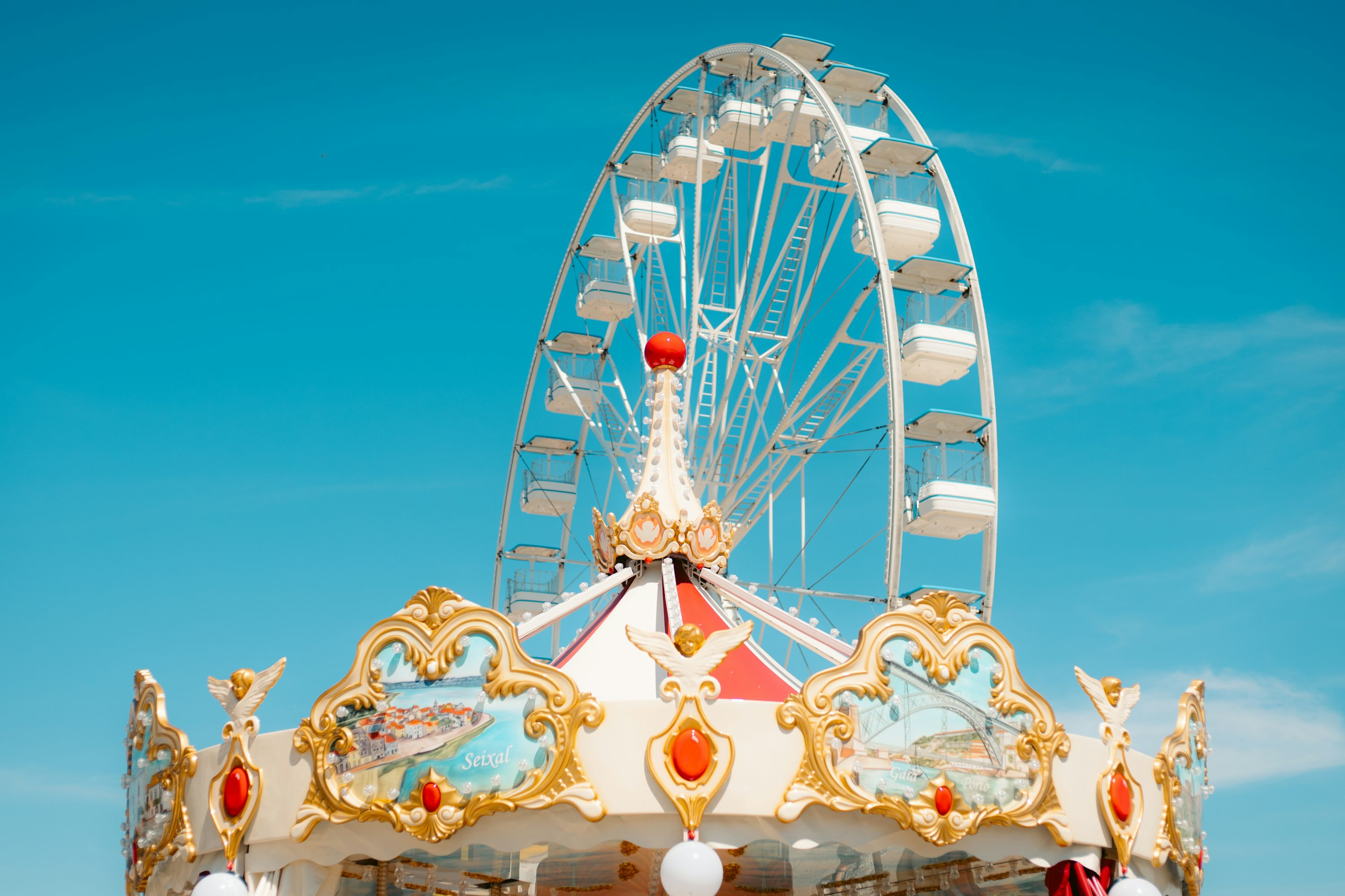 A carnival ride with a ferris wheel