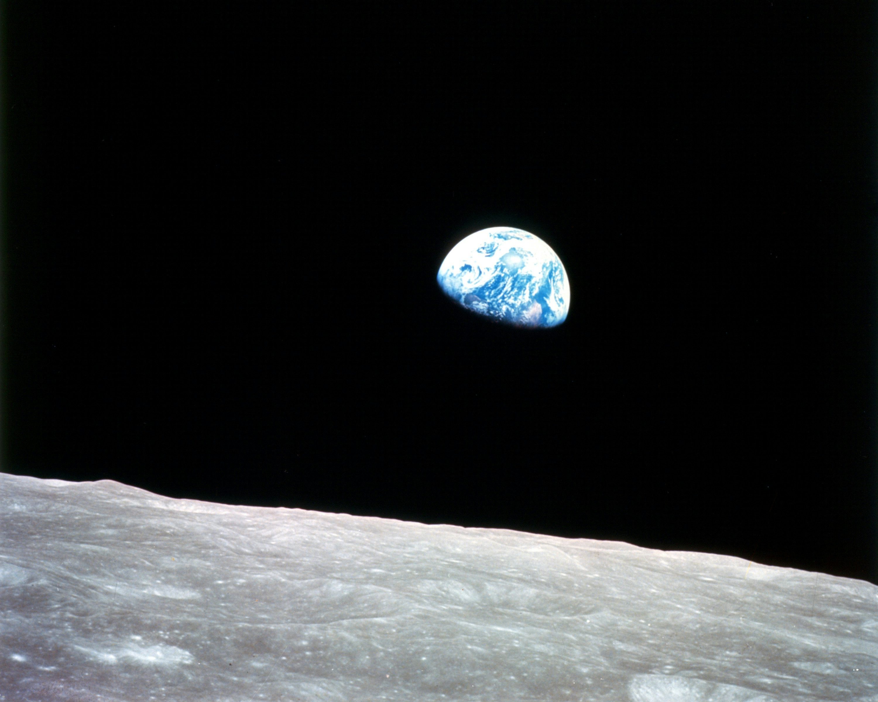 Earth above the lunar surface photo