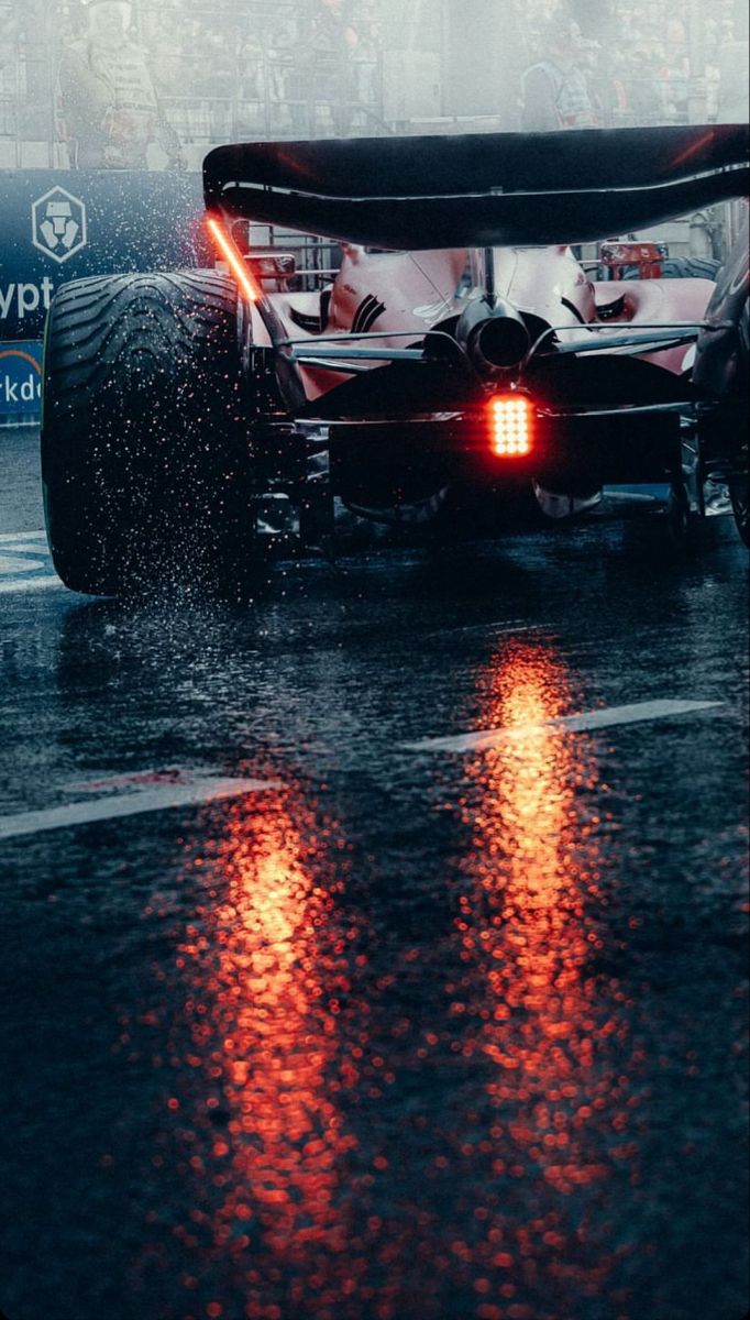 Formula 1 Car Racing in the Rain