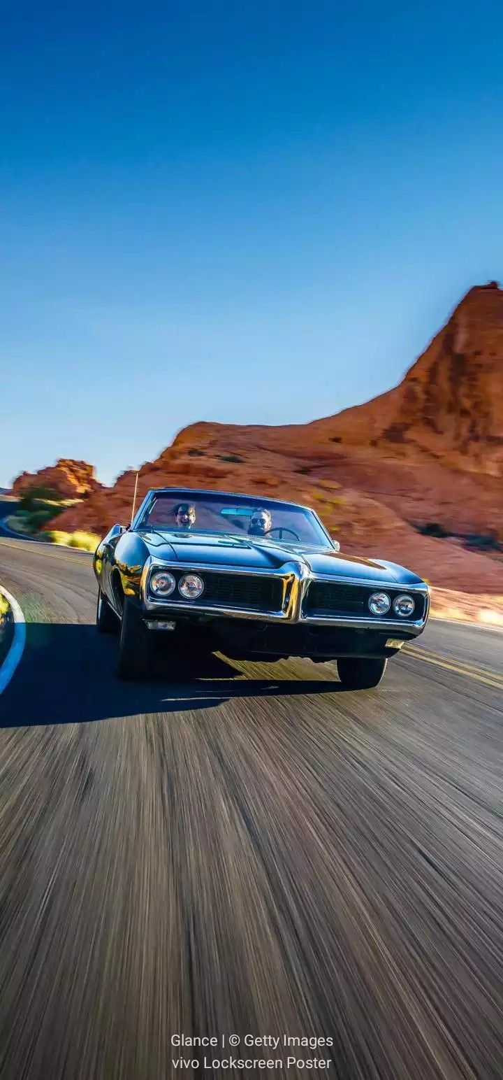 Classic BMW Muscle Car Driving Through