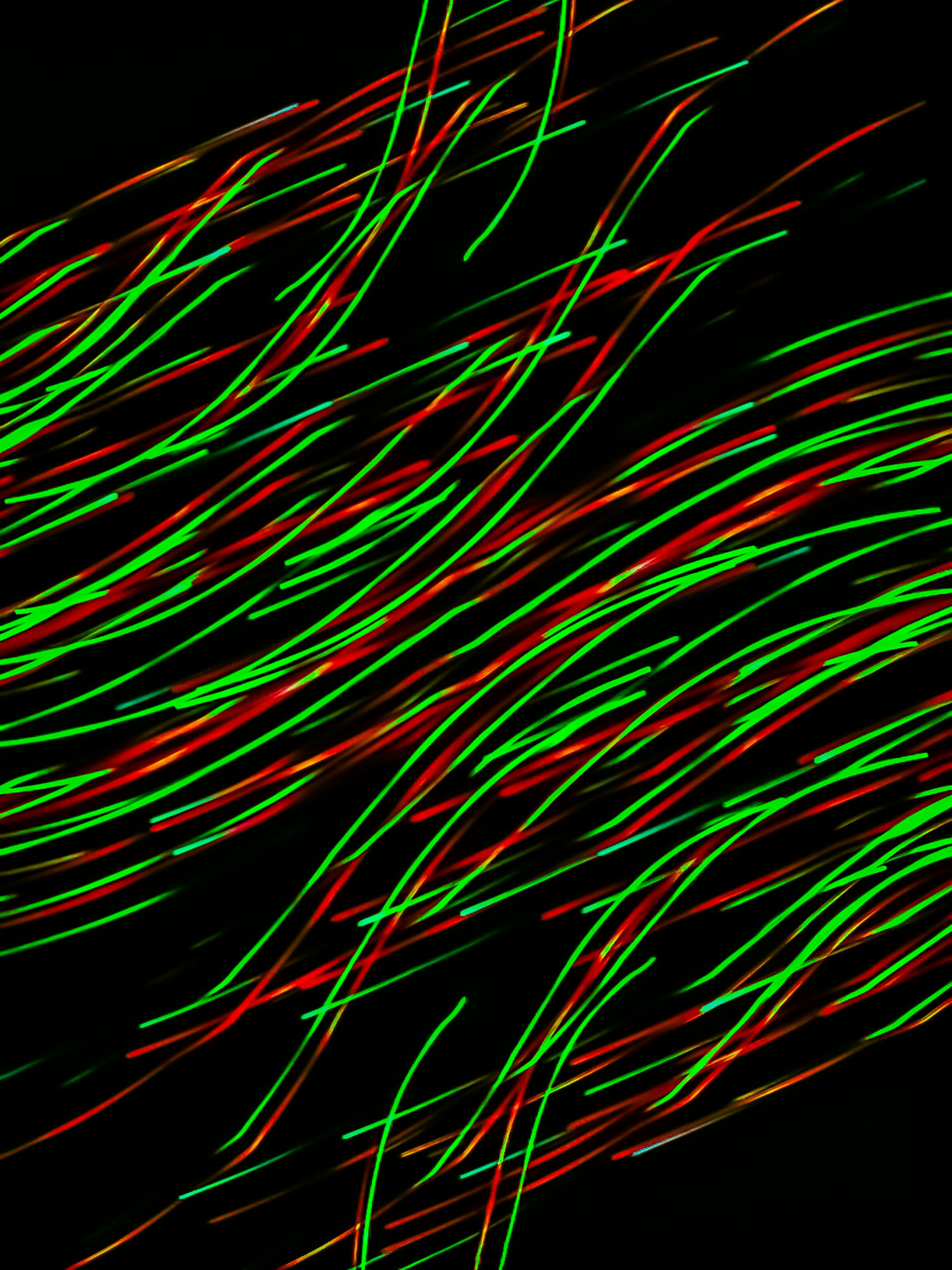 A black background with green and red