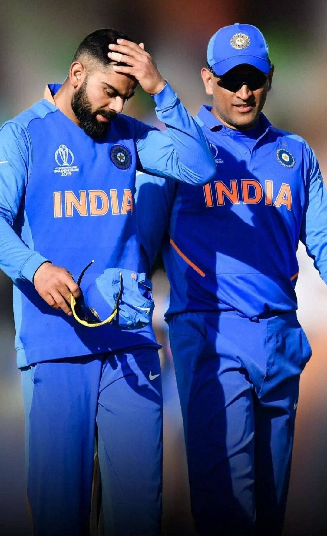 Cricket Icon Kohli Dhoni Moment Wallpaper