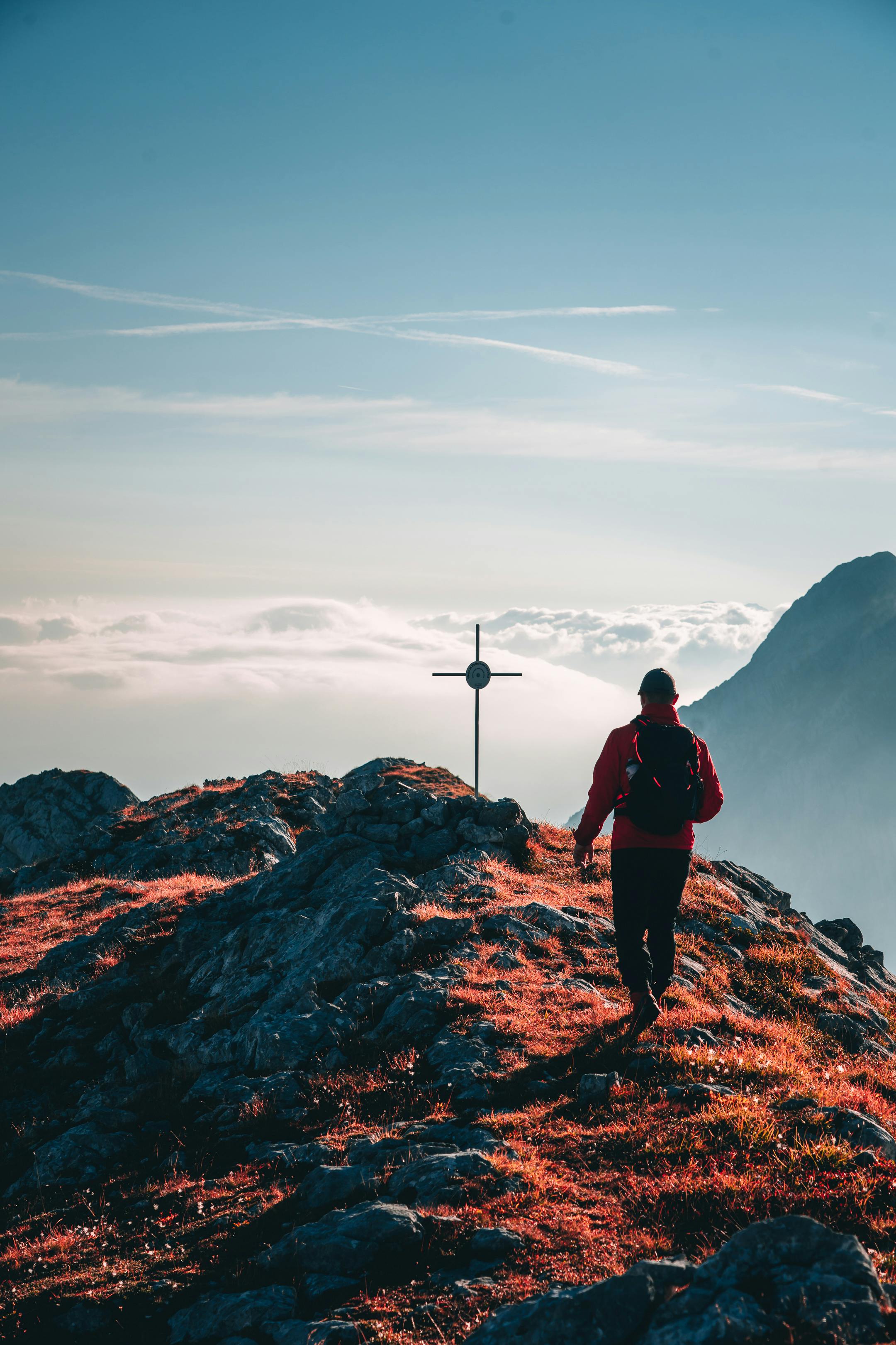 Man Walking Towards the Cross on