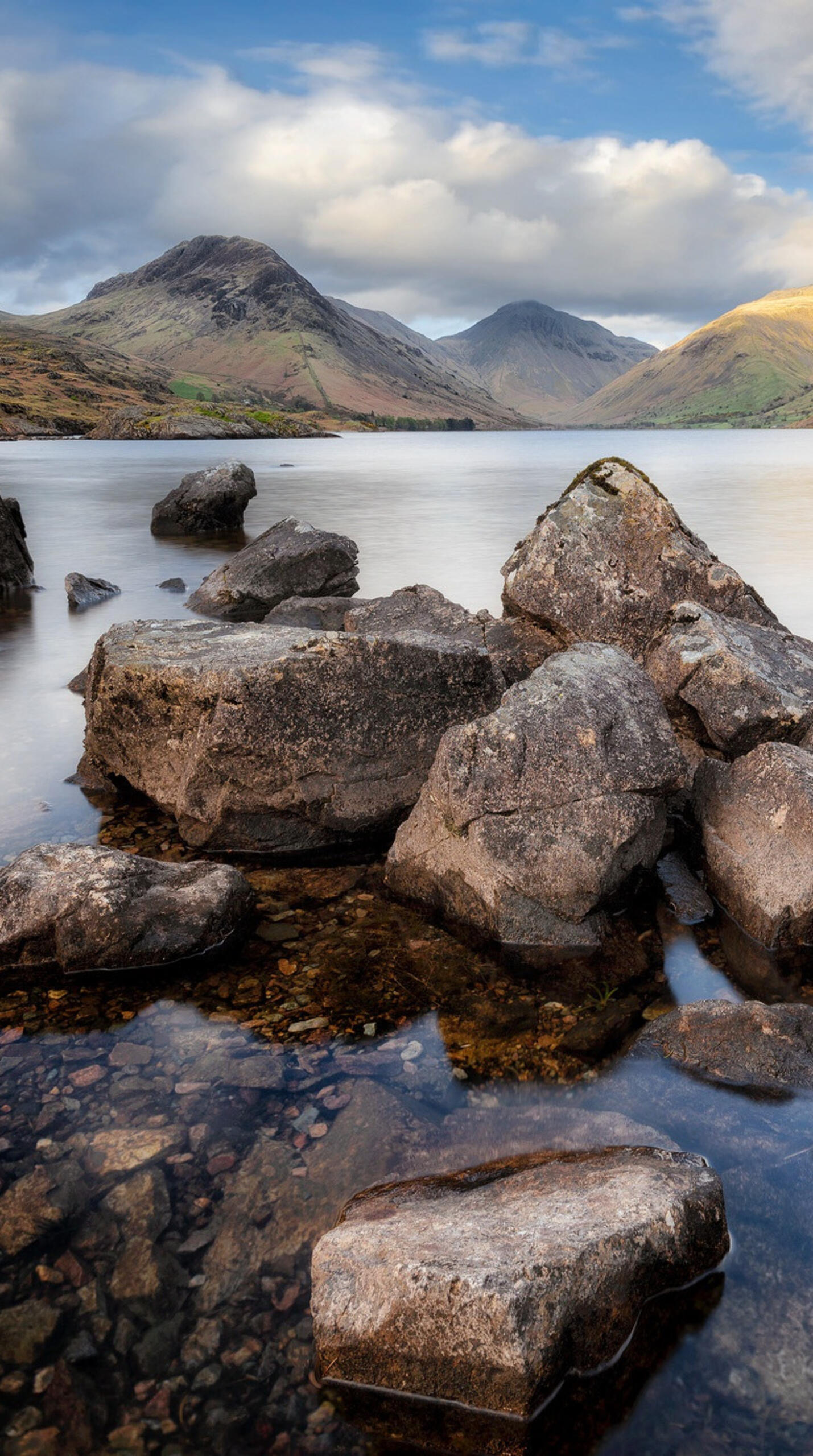Big rocks in the lake · 1440x2560 QHD