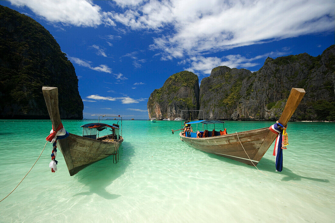 Two boats anchoring in the Maya Bay, a