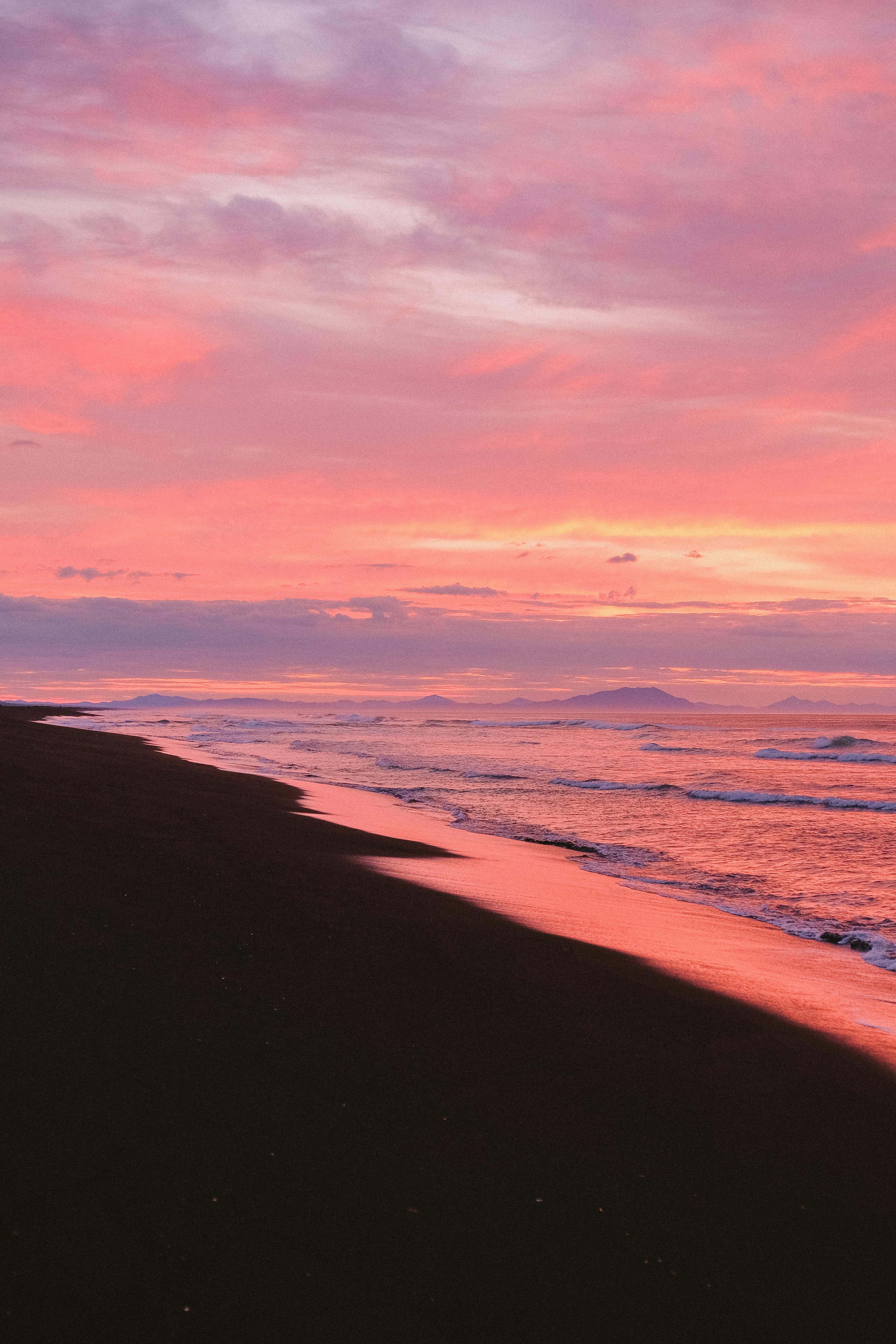 Pink Sky over a Beach · Free