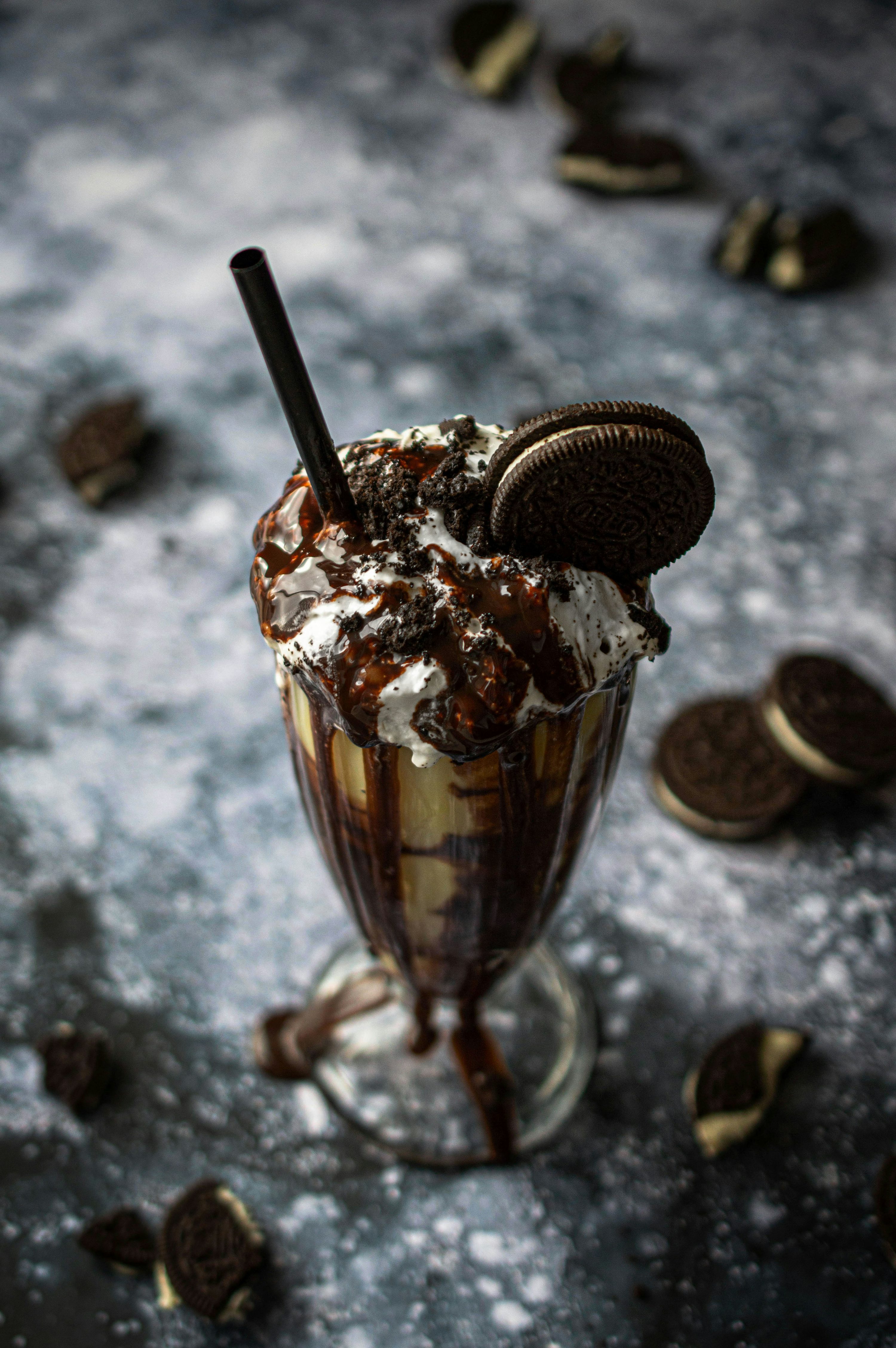 A chocolate ice cream sundae with oreo