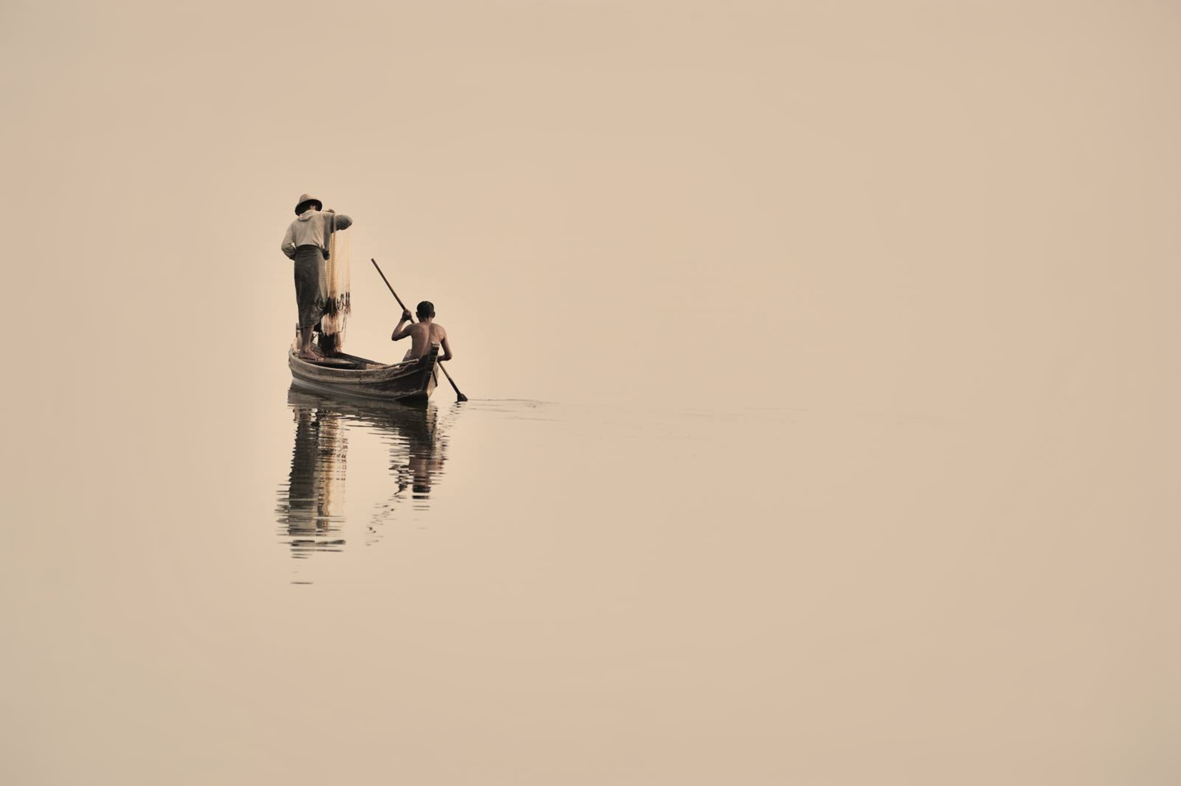 Peaceful Reflections: Fishing on a Lake